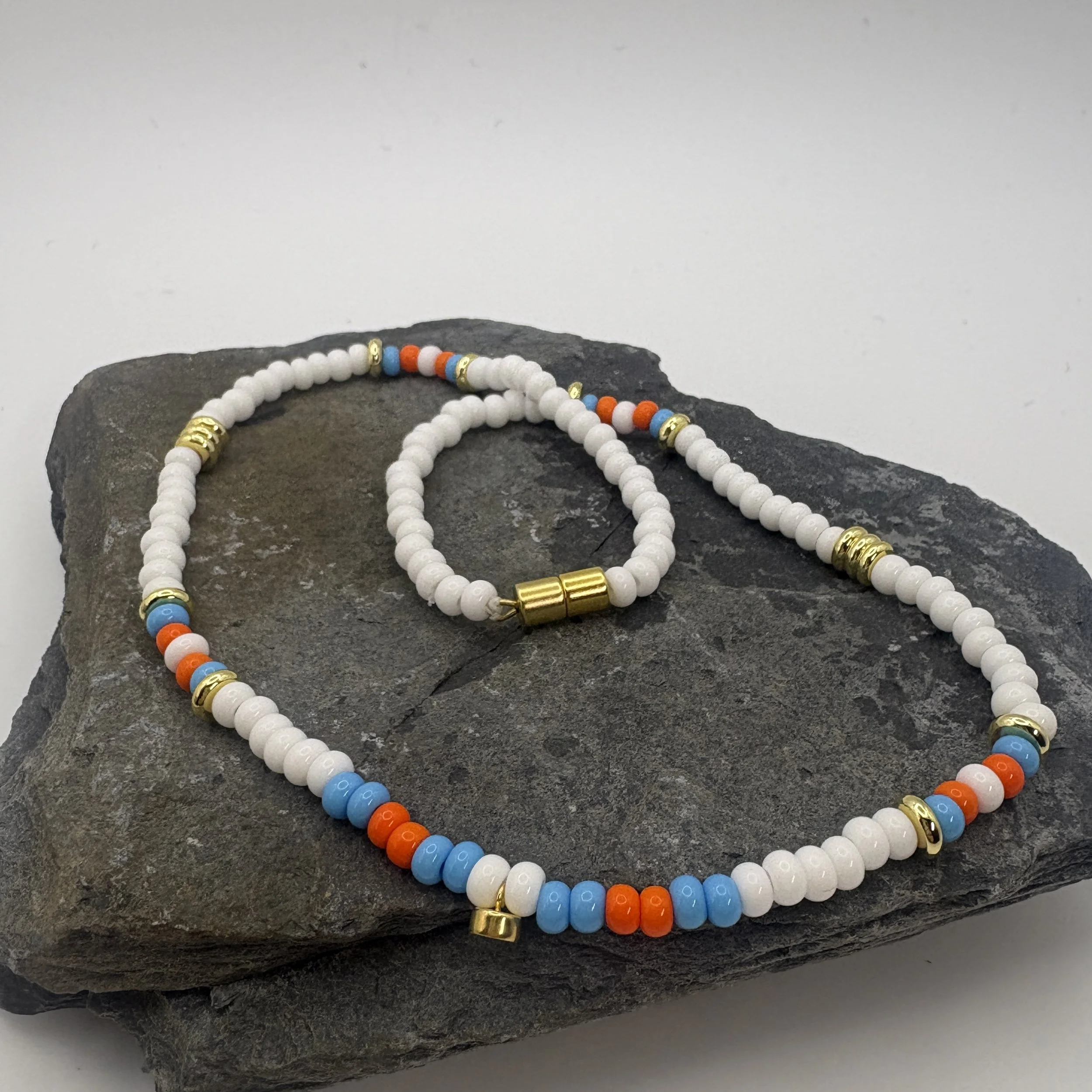 White, aqua and orange necklace