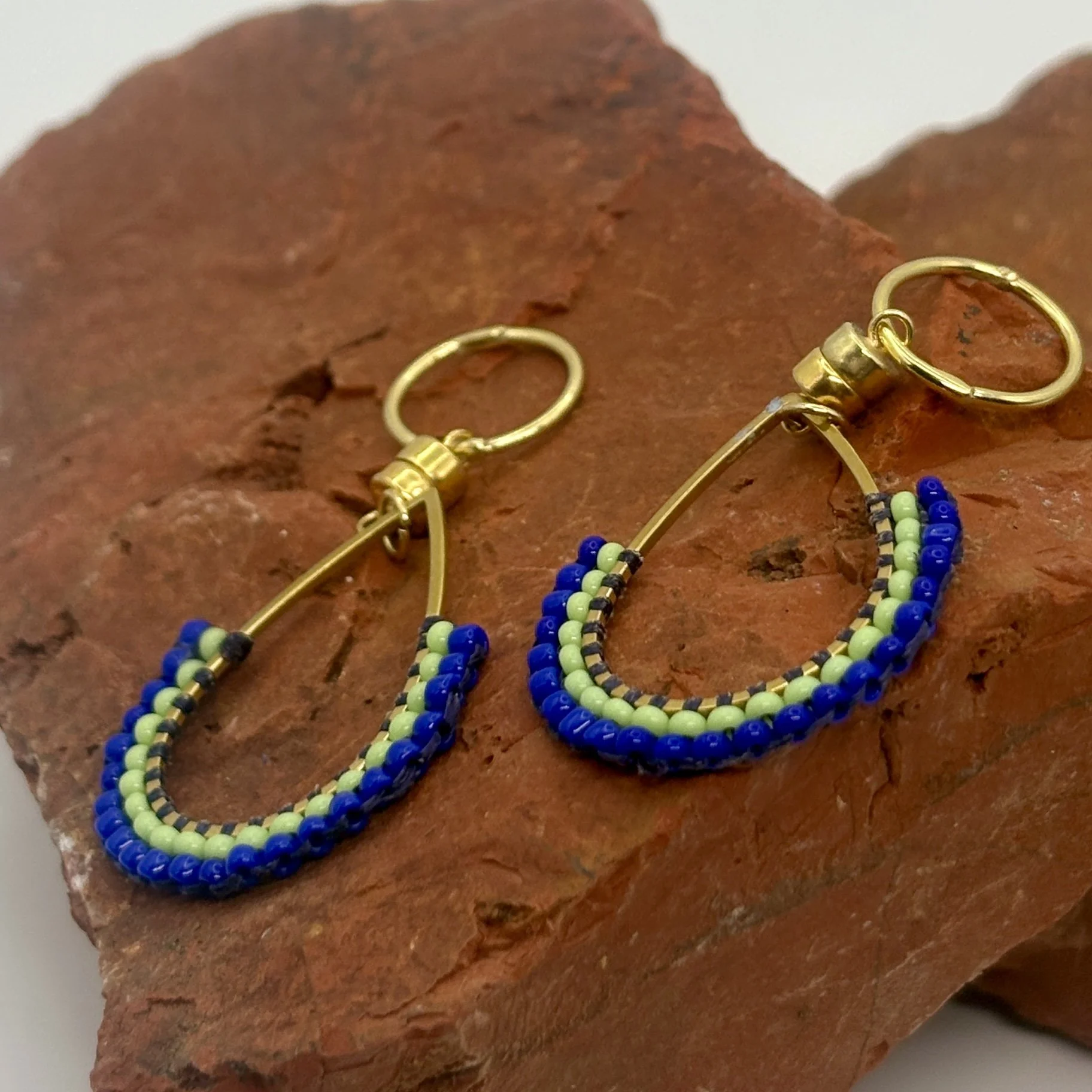 Fan pale green and true blue