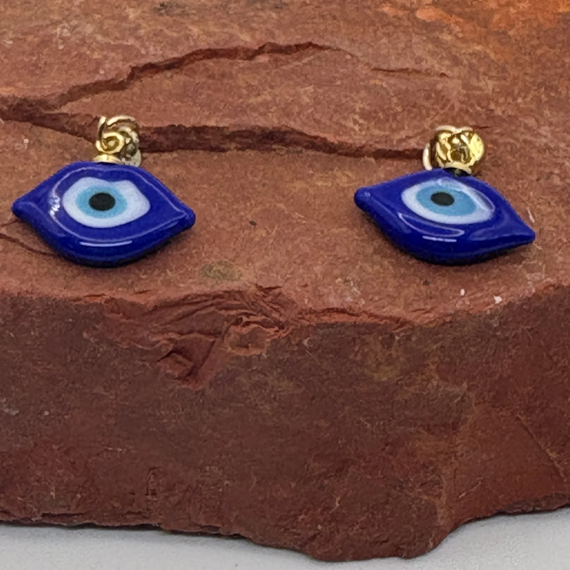 Navy blue glass eye charm