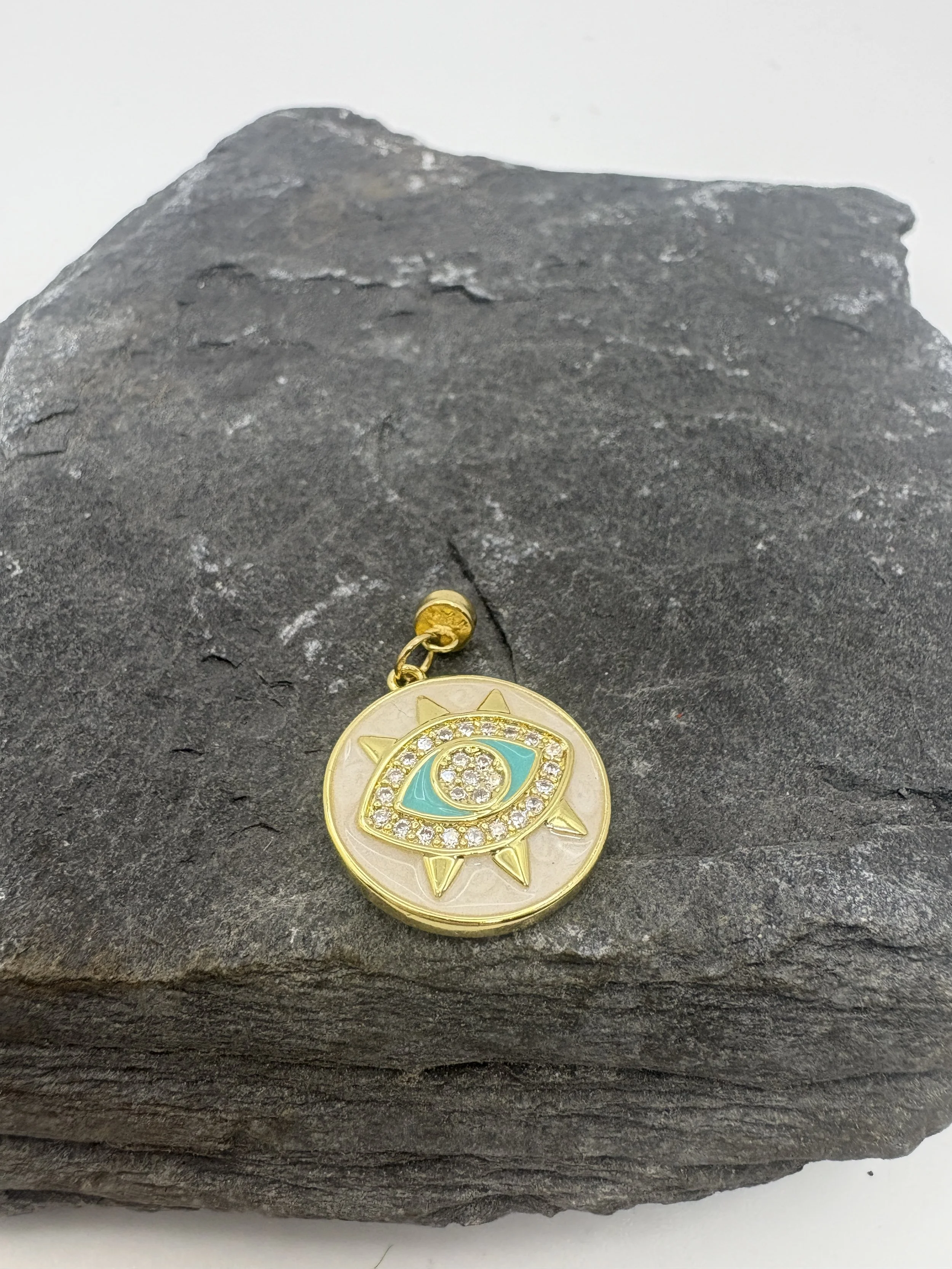 Circular white and blue gold eye Charm