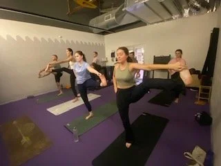 Grace teaching Standing Big Toe Pose at Anytime FItness in Milton, Brisbane