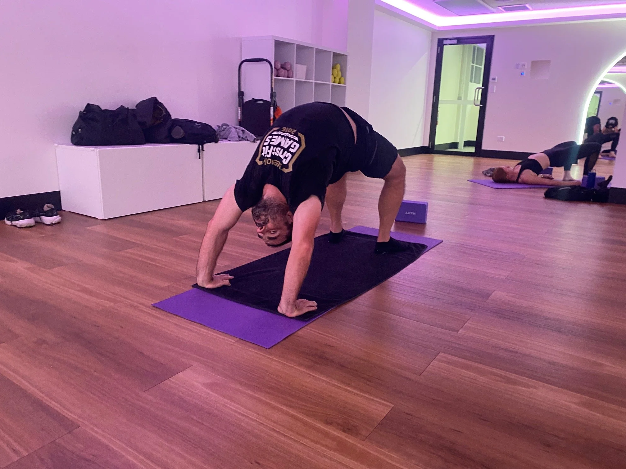 Wheel Pose - one of the peak poses performed by Grace's students at EMF brisbane