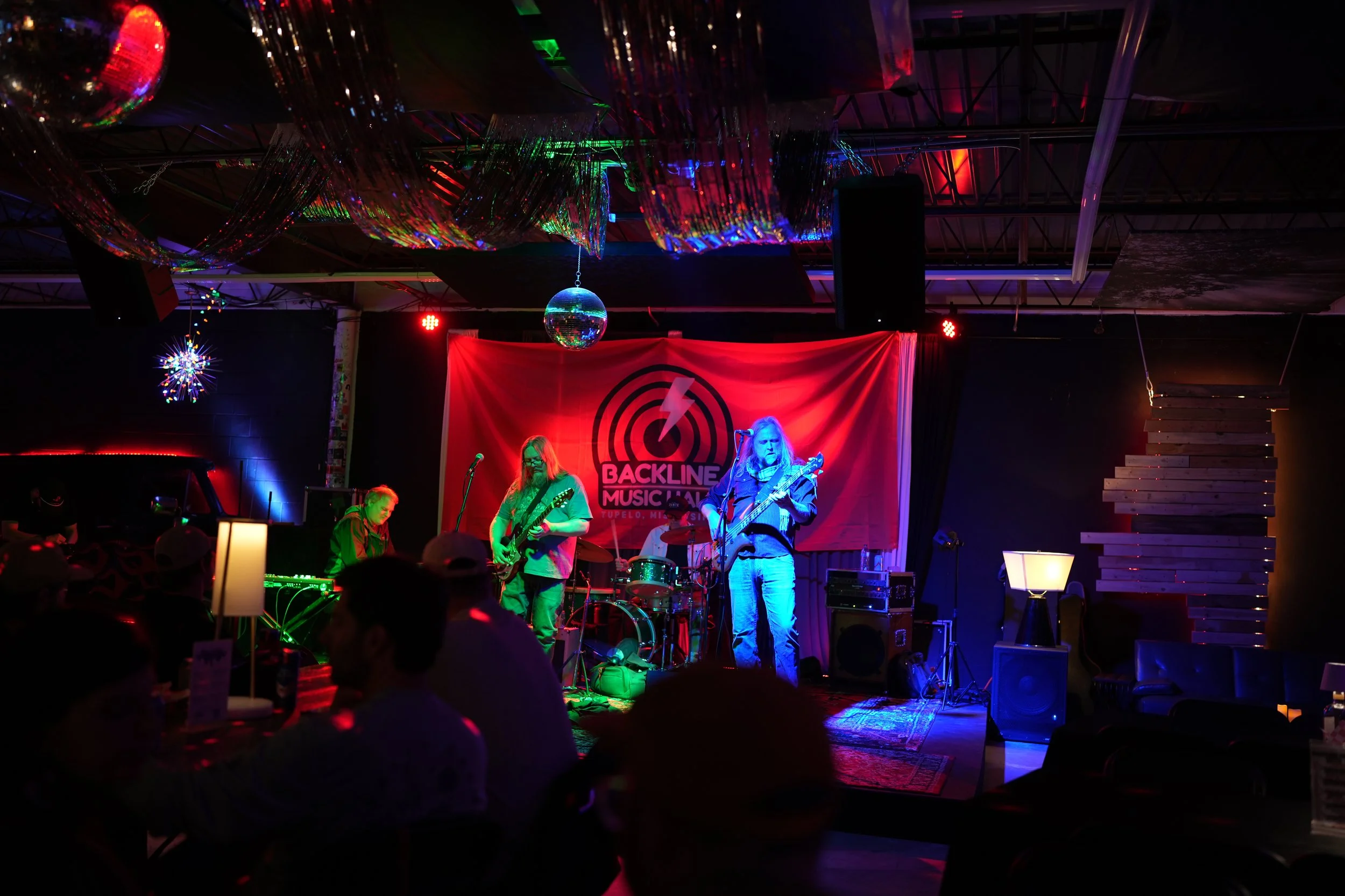 Geometric drawing of an outline square with sections divided by vertical, horizontal, and half circle lines.