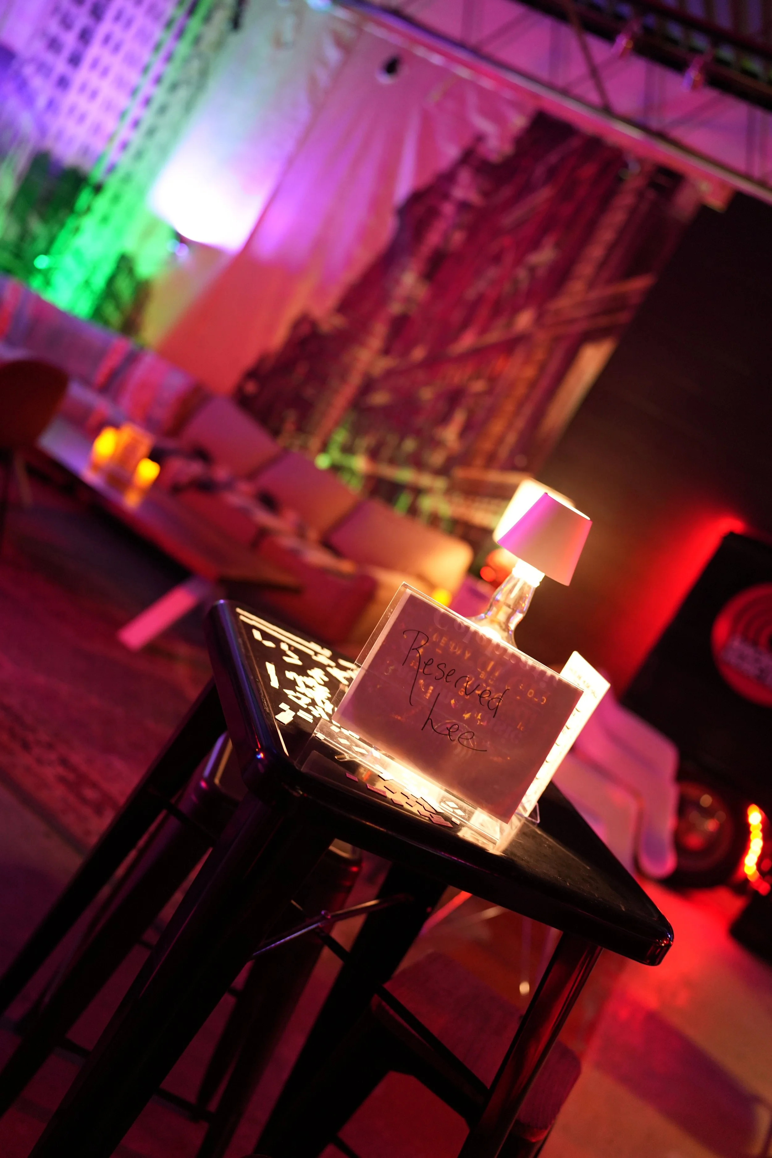 Geometric drawing of an outline square with sections divided by vertical, horizontal, and diagonal lines.