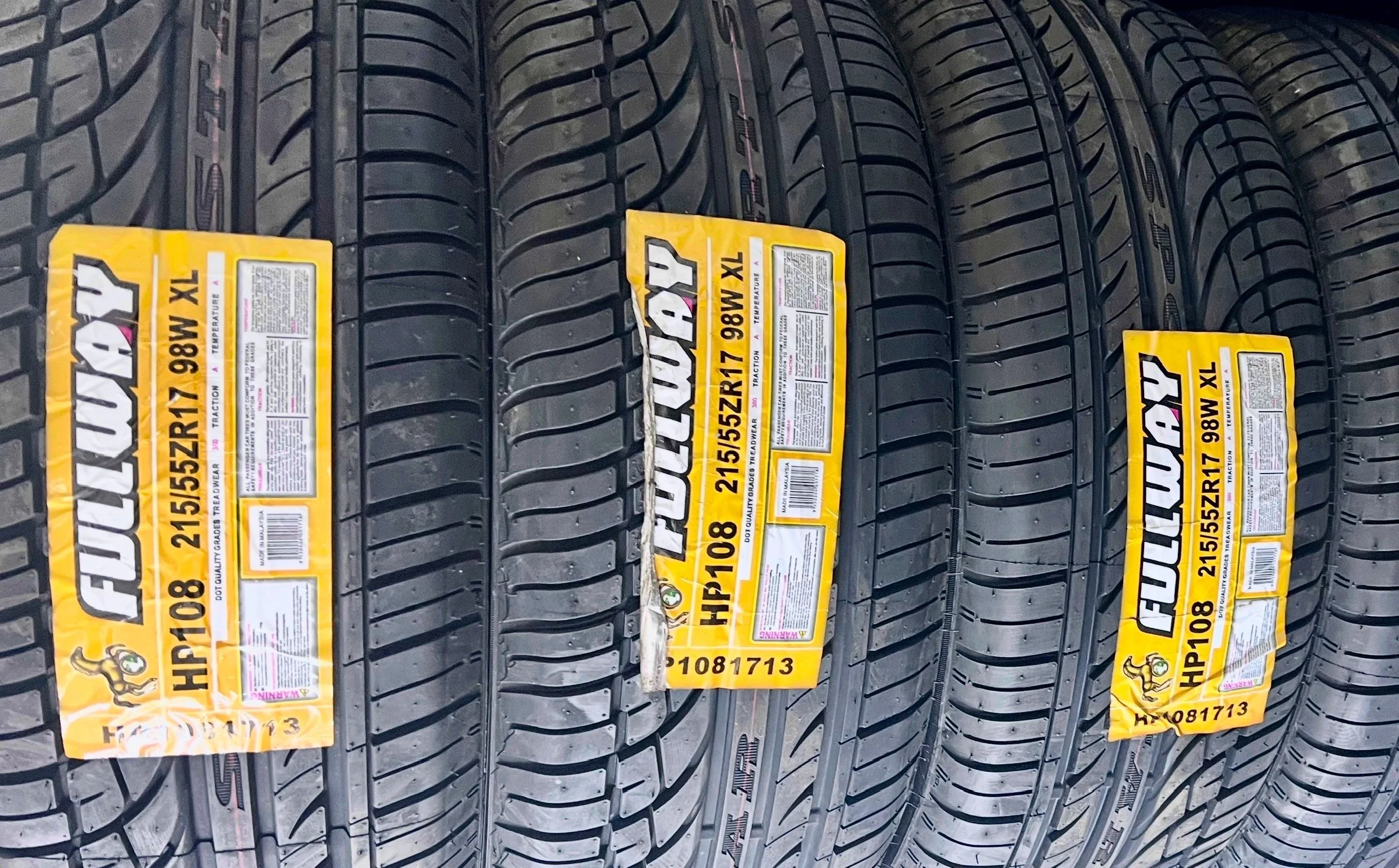 Close-up of new car tire with tread patterns, all season, all terrain, cosmo tires available