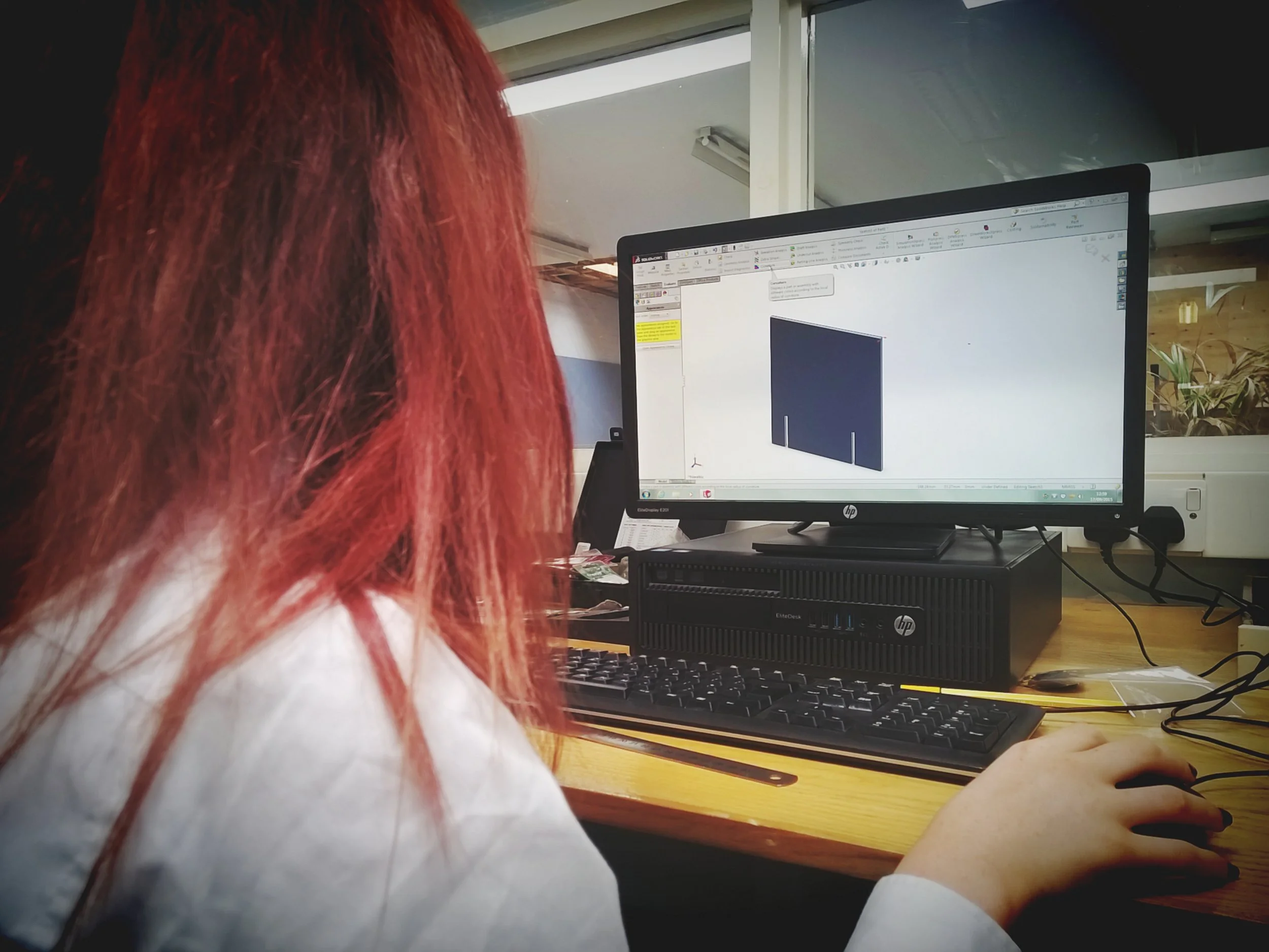 School girl using CAD software