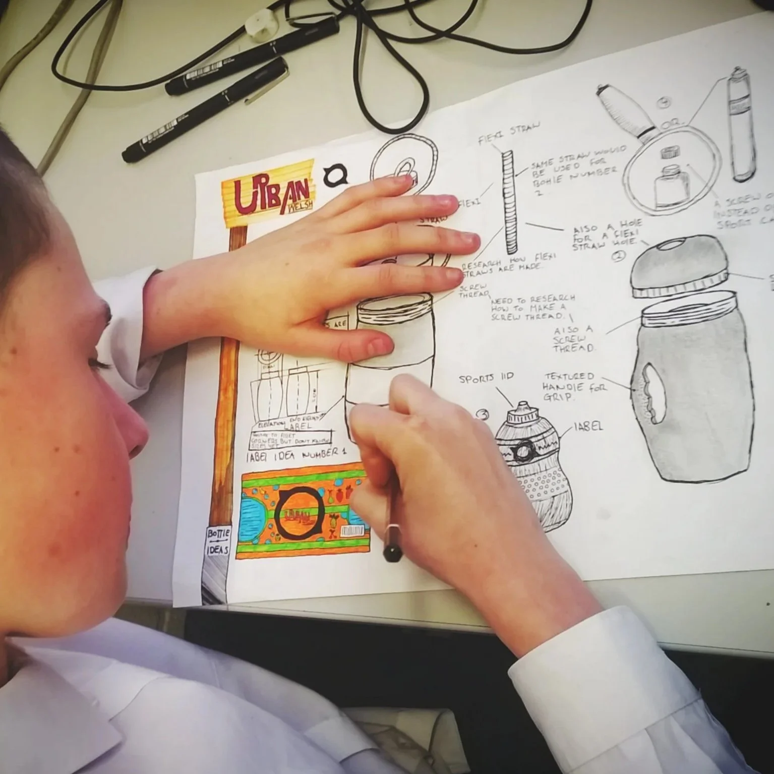 Pupil creating freehand thumbnail sketches
