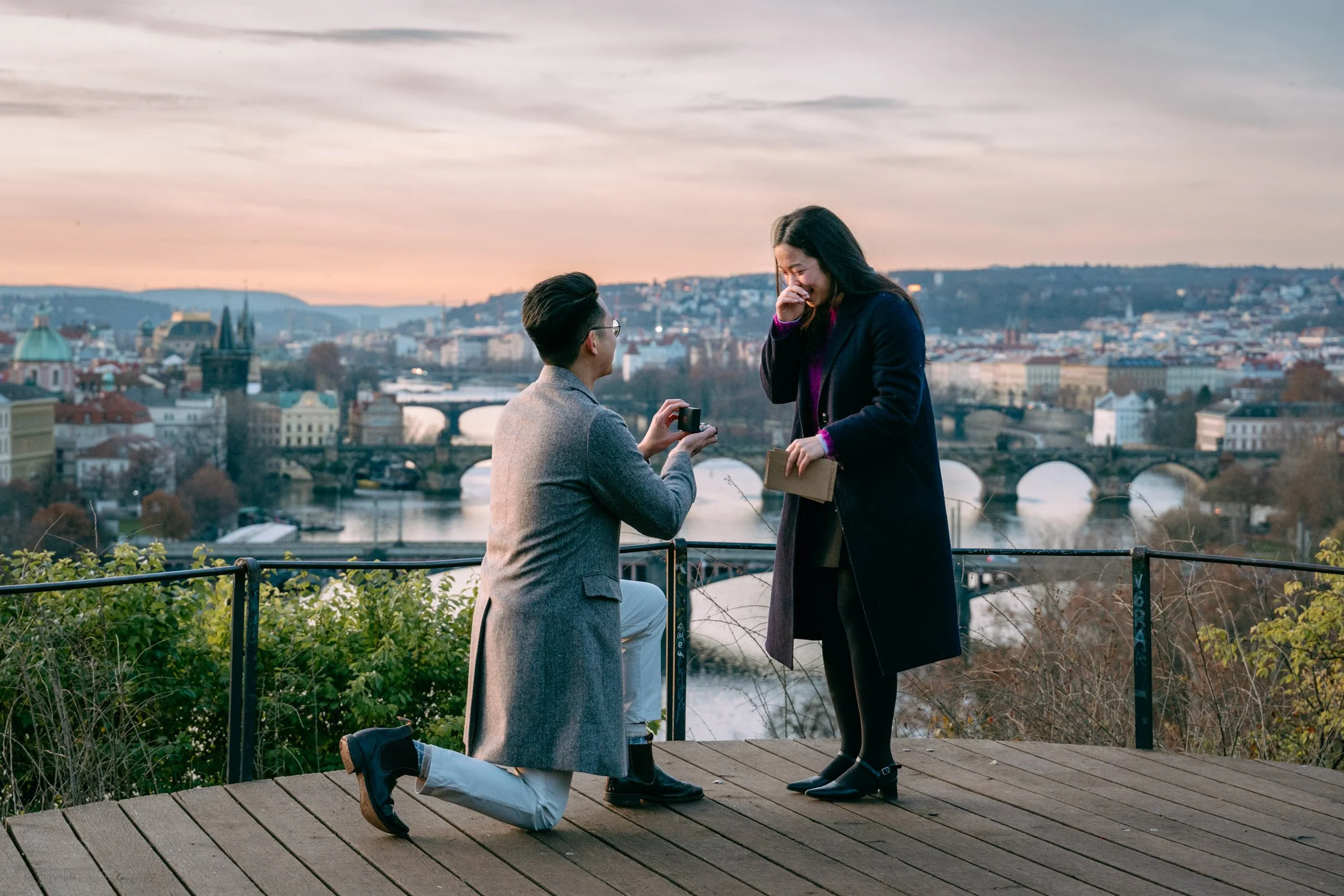 Man proposing at sunrise in Prague, captured by Prague engagement and proposal photographer Dan Hromada.