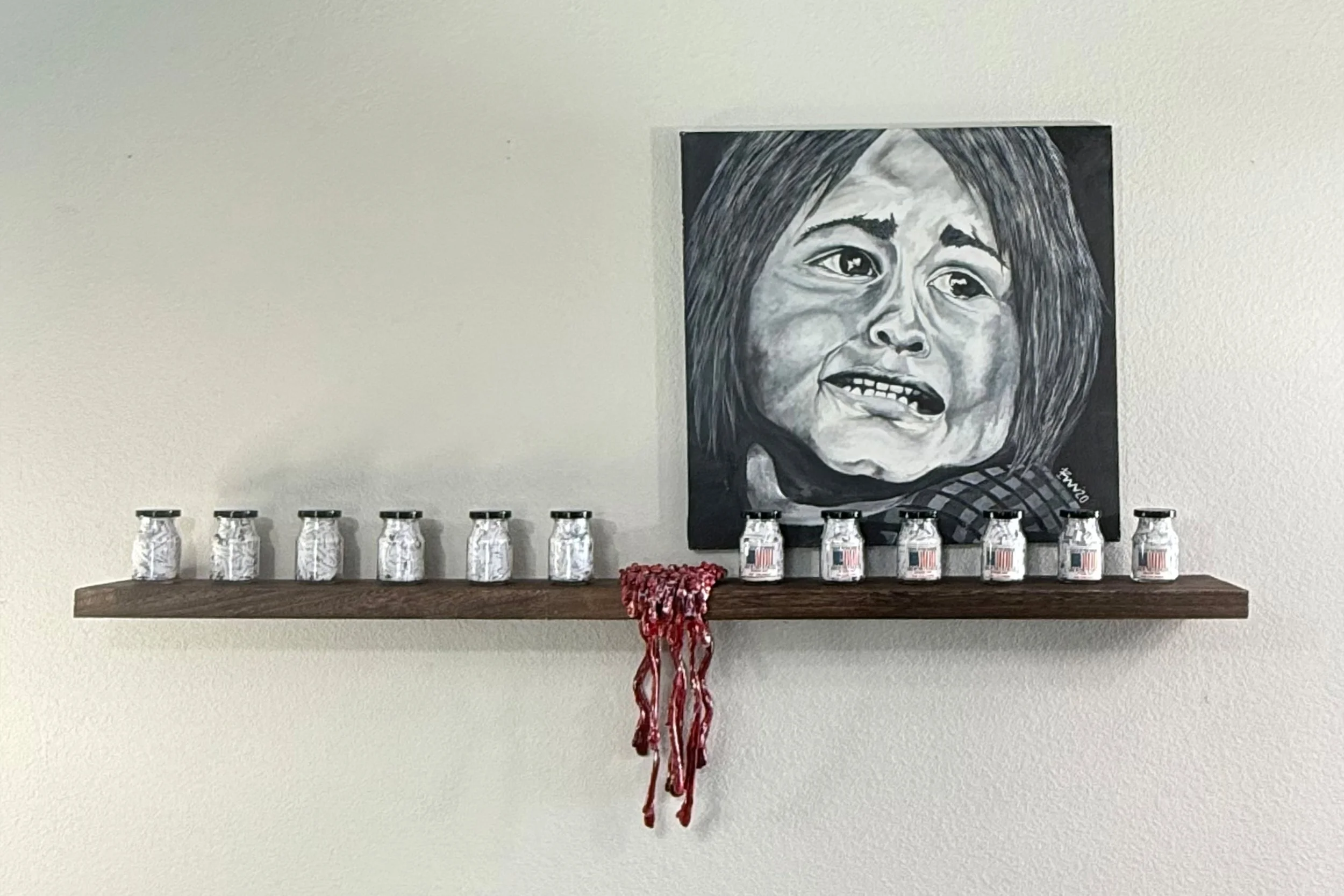 Where are the childrens
Mix-Media: Ceramic, Mason jars, Printing labels , print paper, wood shelf acrylic on Canvas 
Wood shelf: 60"W x 1.5" D x 17"H
Canvas: 24”W x 24”Hx 1.5”D
2024-2025