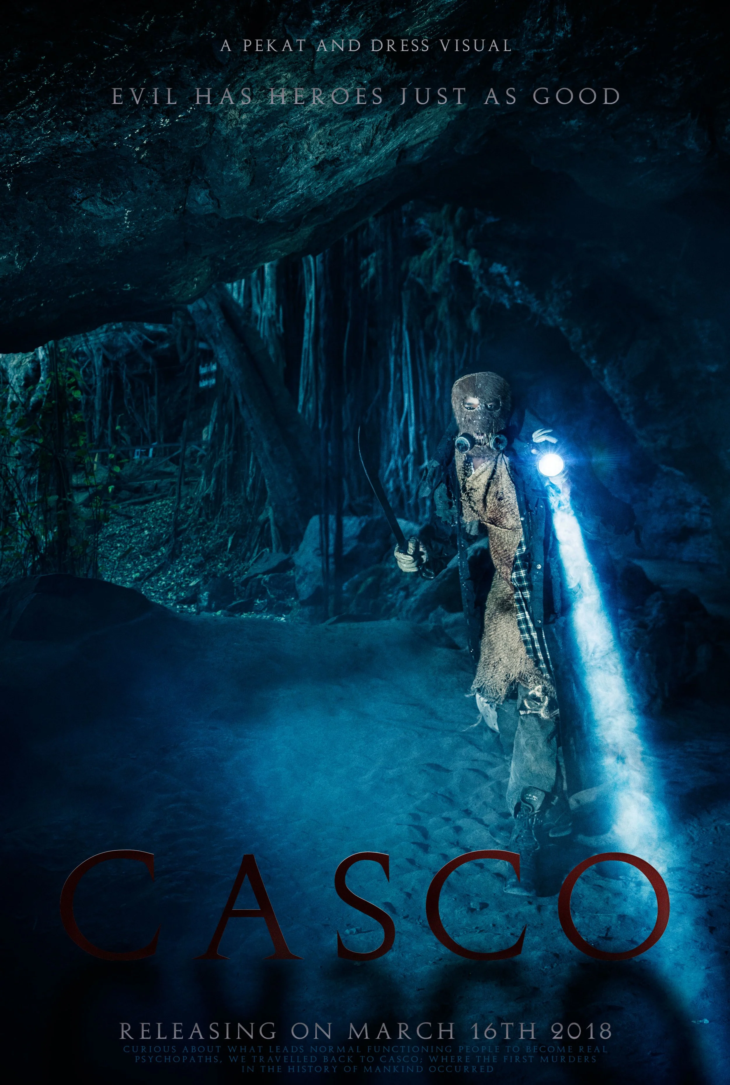 Dark cave with a figure wearing a gas mask and holding a flashlight, with text overlay about a movie release date.