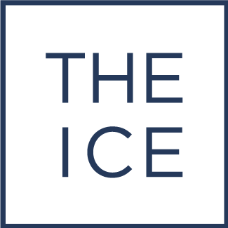 A white sign with a navy blue border and the text 'THE ICE' in navy blue capital letters.