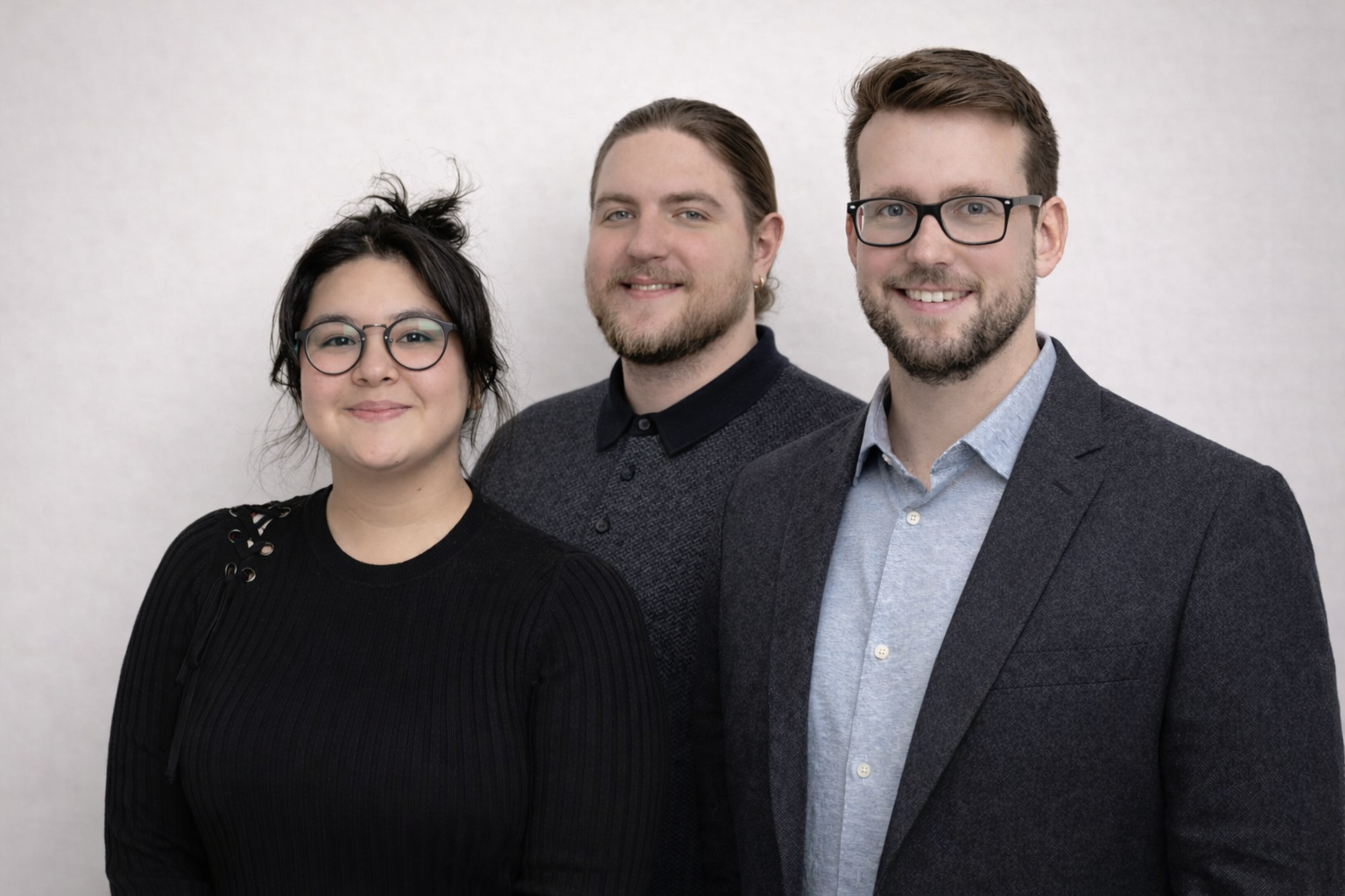 Professional insurance agency team portrait featuring licensed insurance agents and staff, representing a trusted local insurance office specializing in auto, home, life, and business insurance services.