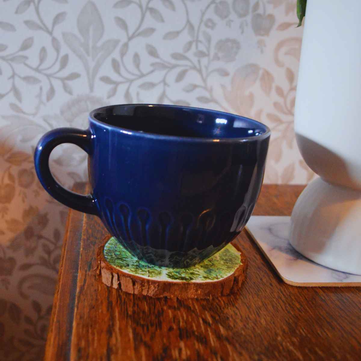 "the valley" with mug.png