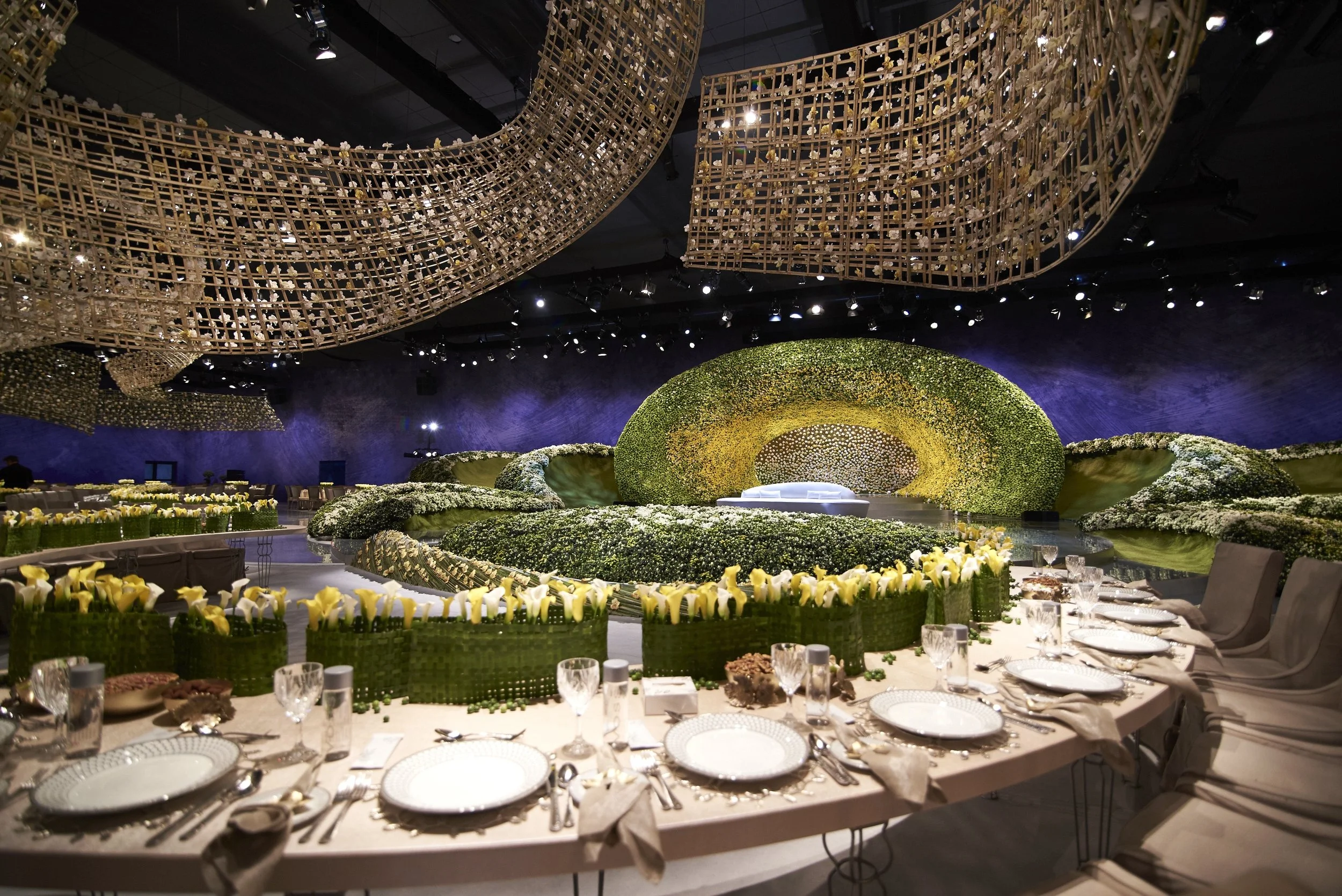 Spectacular wedding stage with sculptural green and yellow floral landscapes by Daniel Ost