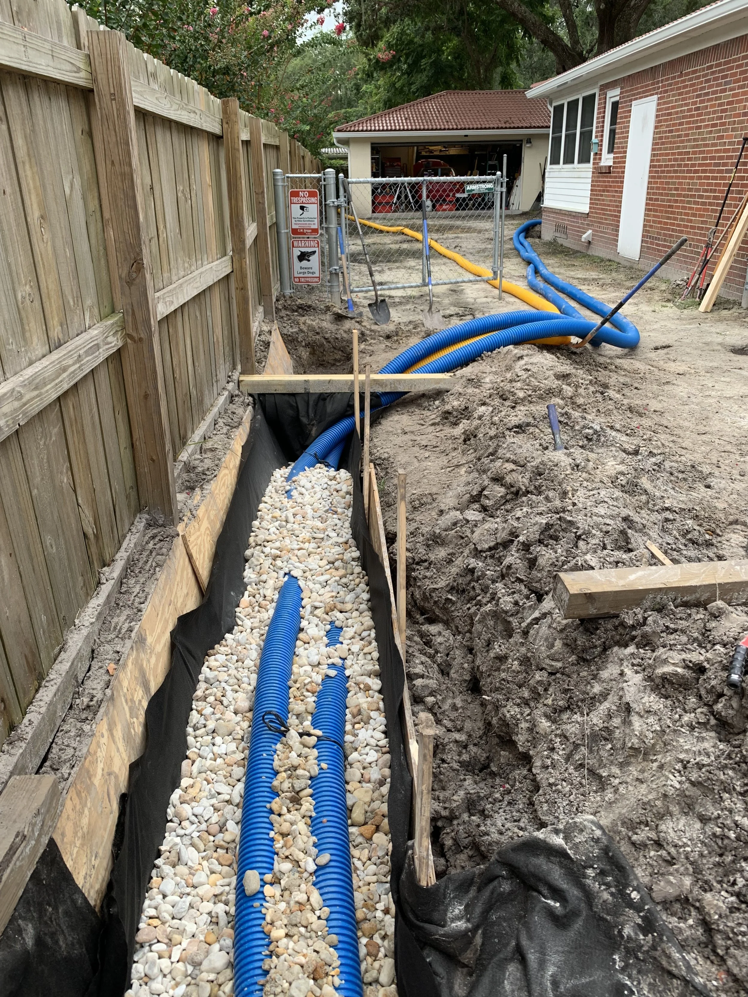 Large French drain connected to sump pump system by First Coast French Drains in Jacksonville, FL.