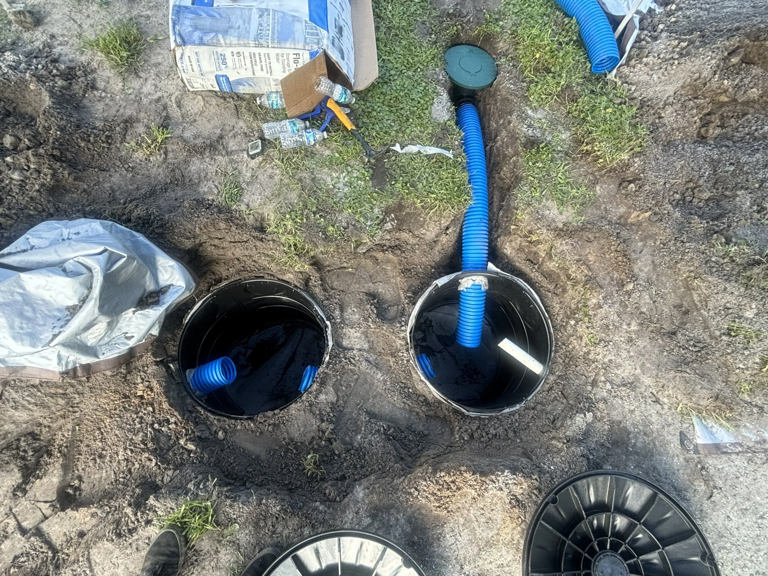 Sump pump drainage system installed by First Coast French Drains in Jacksonville, FL.