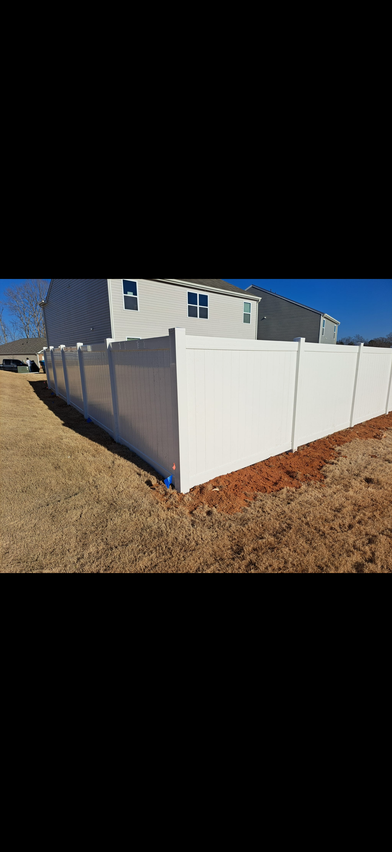 White vinyl fence