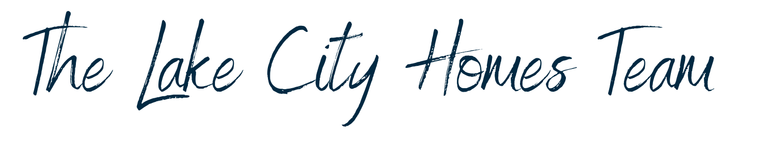 Text saying 'The Lake City Homes Team' in blue handwritten-style font on a black background.