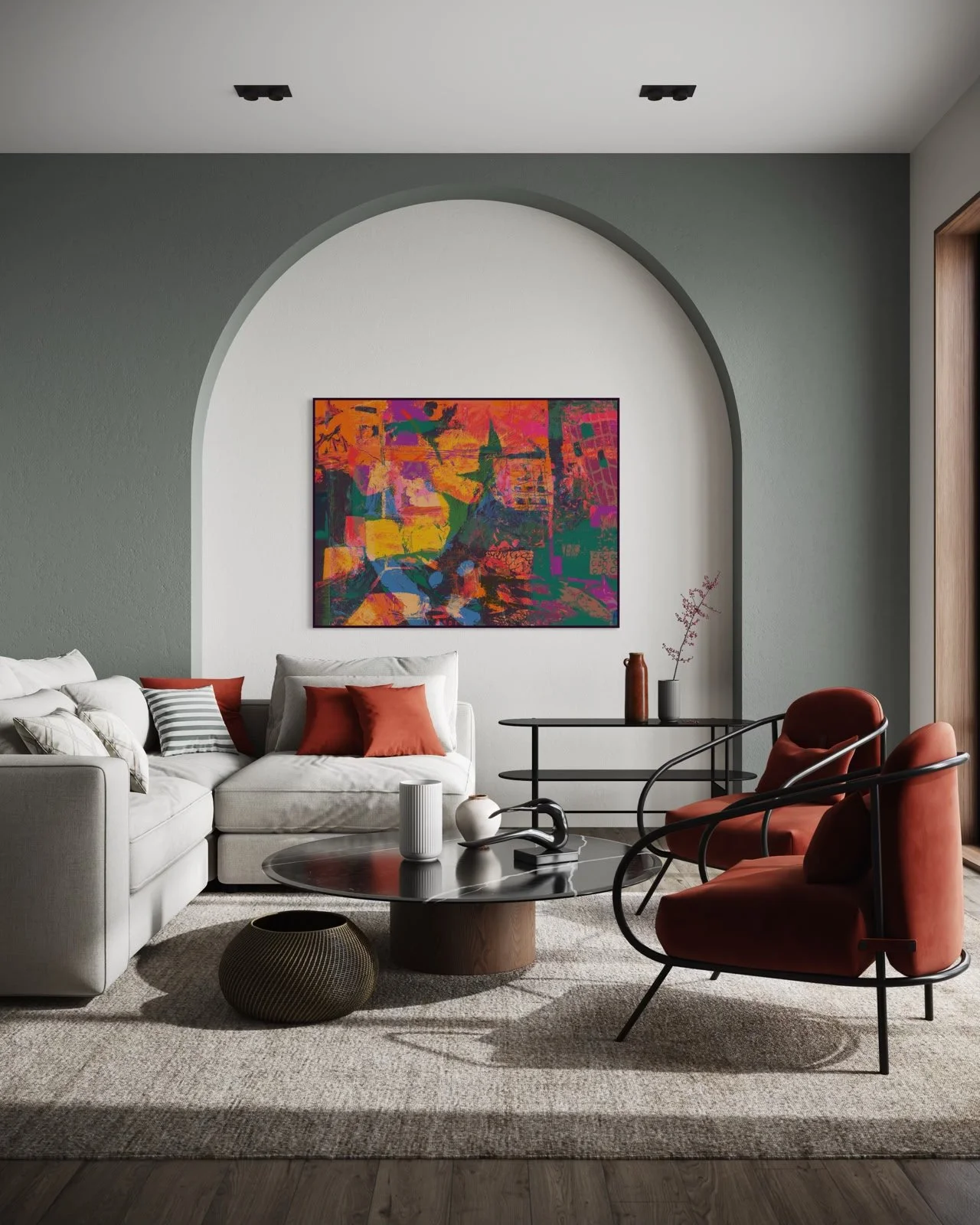 Modern living room with gray and white walls, colorful abstract art, a white sofa with rust and striped cushions, round coffee table with decorative vases, and rust-colored armchairs with black frames, natural light from a large window.