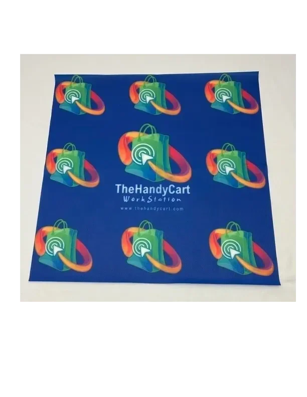 Blue sheet with a repeating logo of green shopping bags with a white Wi-Fi signal icon and orange and yellow swirls, and text that reads "The Handy Cart Work Station www.thehandycart.com".