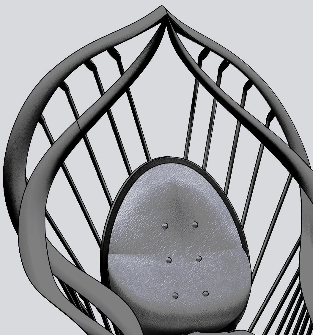 A black metal chair with a rounded back and a padded seat, viewed from above.