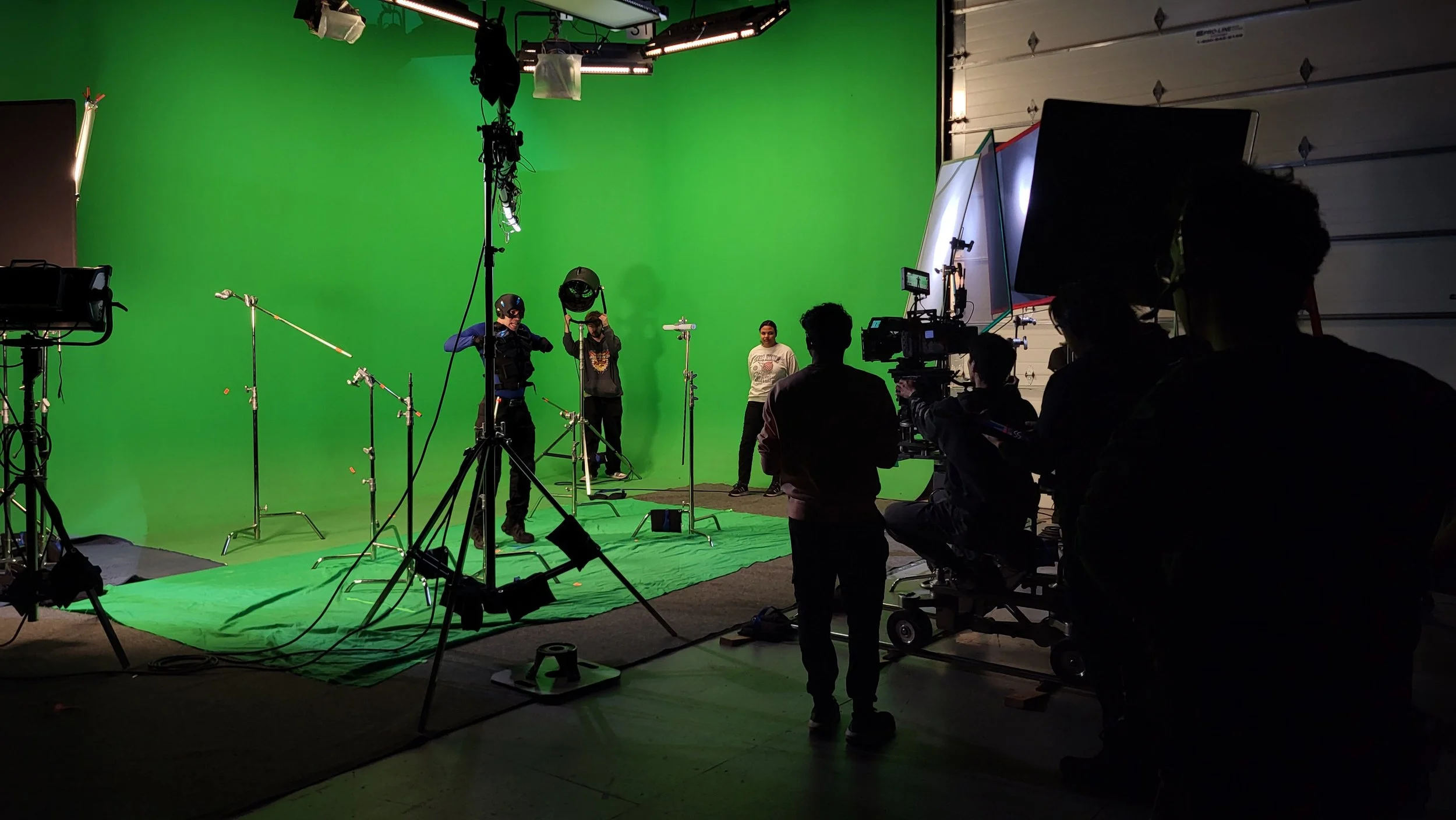 The film included many greenscreen sets that I worked on for my first time. A lot of the shoot included was a fight on a train, which meant setting up an overhead rig and DMX'ing the tubes to mimic fast moving sky.