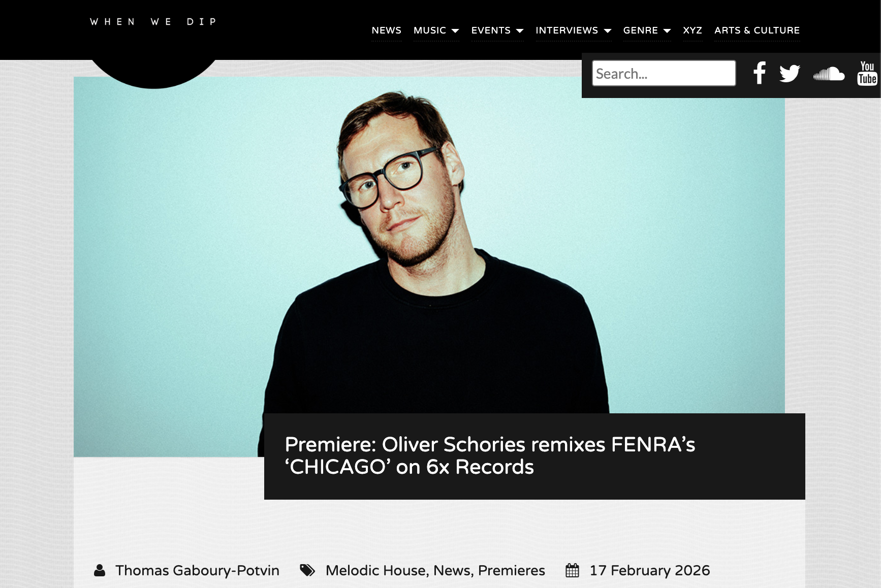 Webpage image of When We Dip Magazine showing electronic musician and producer Oliver Schories standing in a photo studio standing in a black shirt and glasses for FENRA Remix