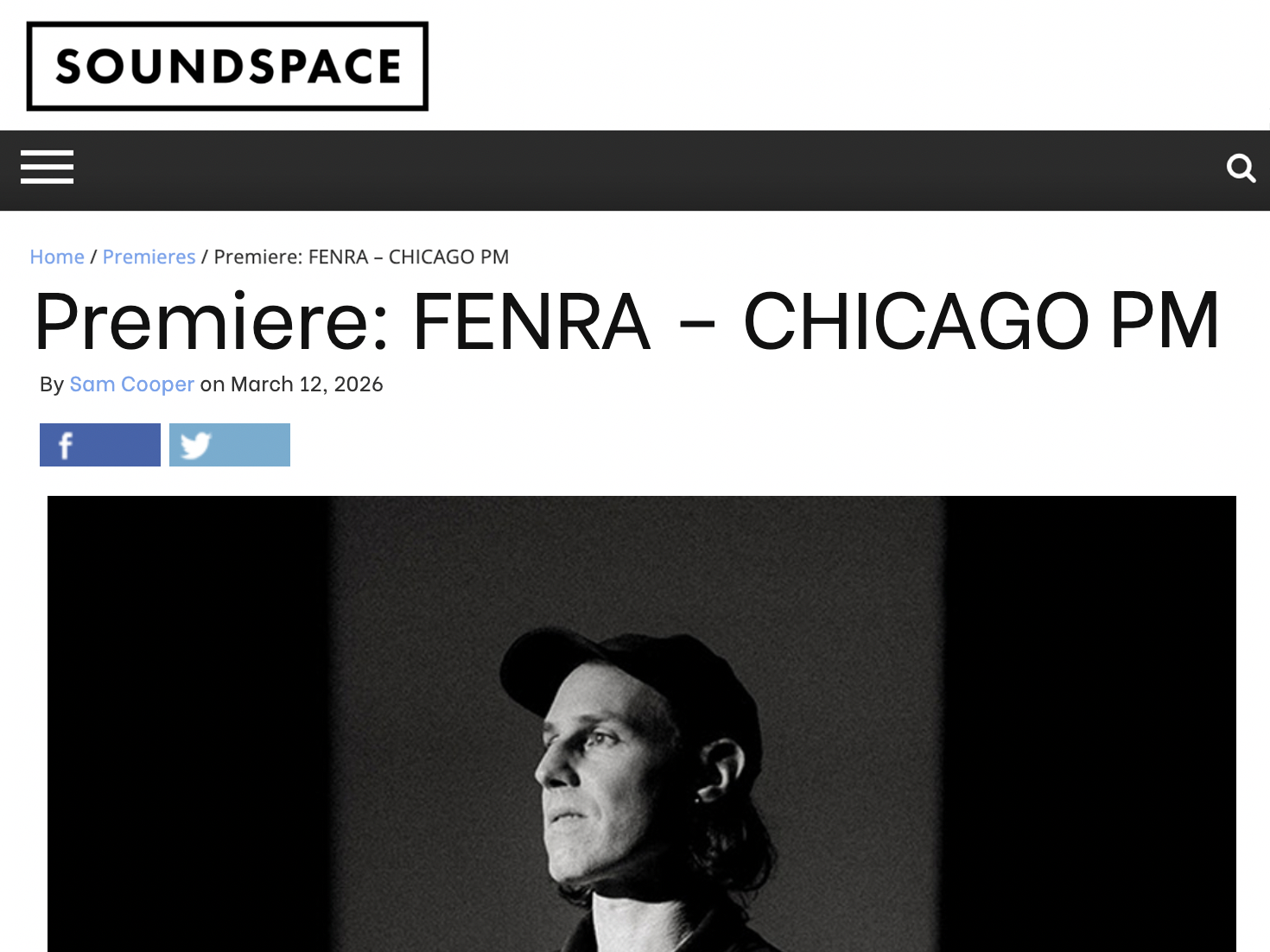 Webpage image of SOUNDSPACE Magazine showing electronic musician and producer, FENRA, standing in a photo studio standing in a dark shirt and cap.