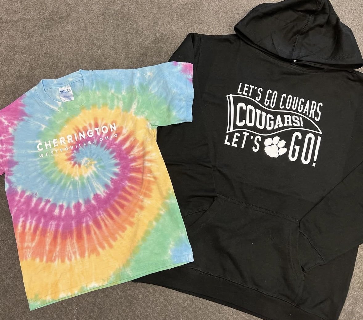 Custom spiritwear shirts and hooded sweaters.