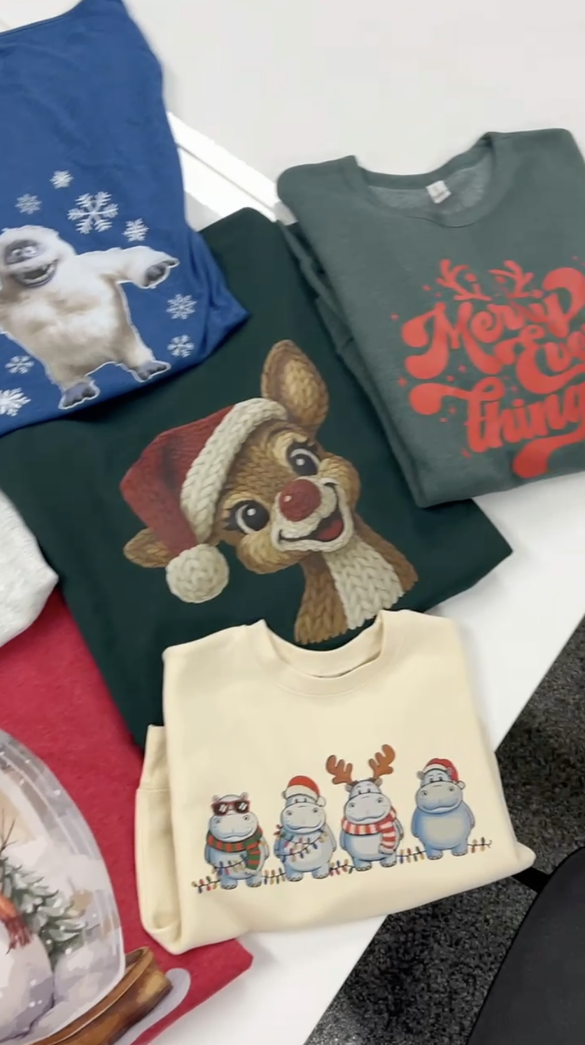 Holiday themed print party finished garments with holiday inspired designs.