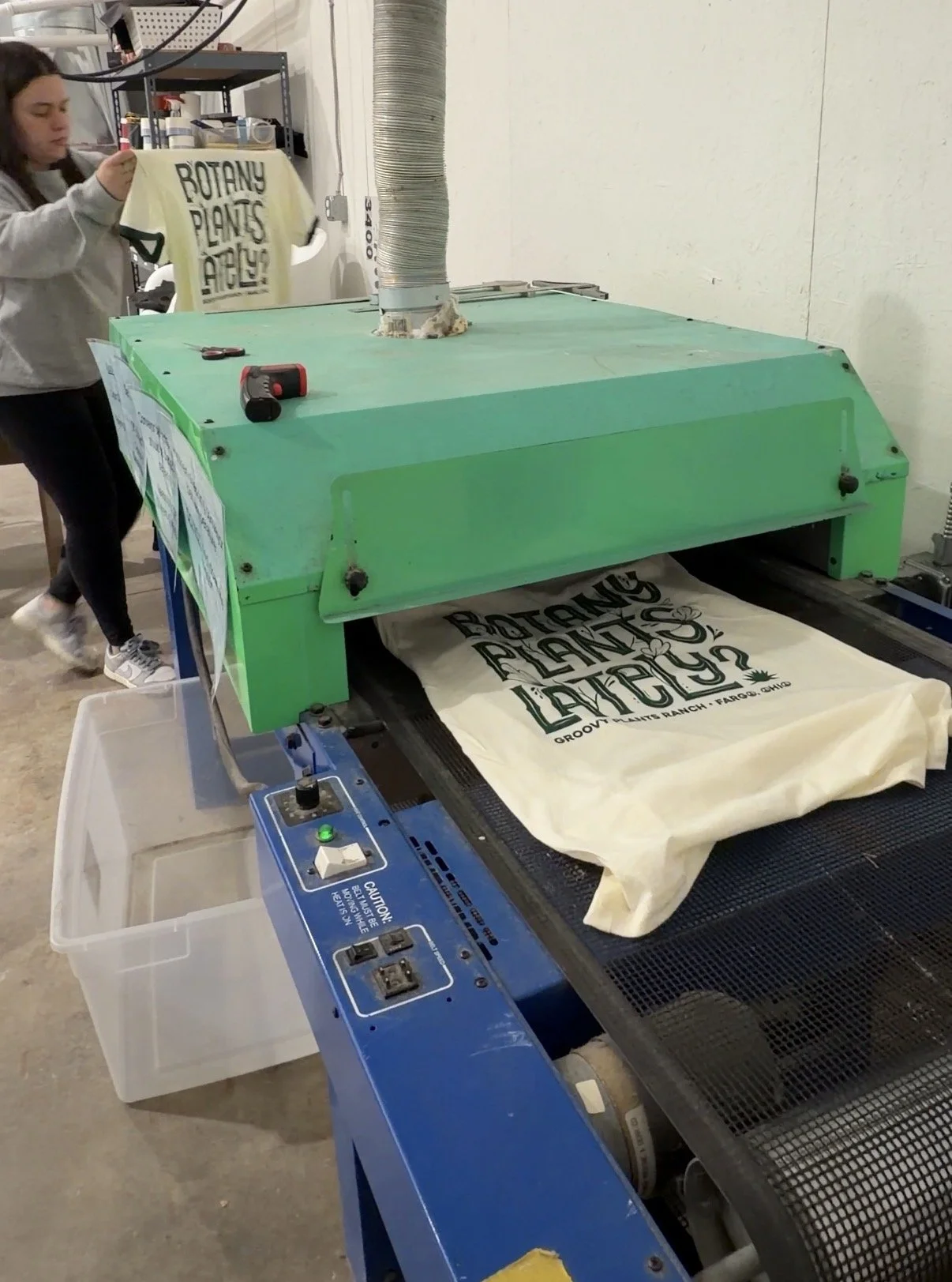 Multiple shirts with identically printed consistent logo placement.