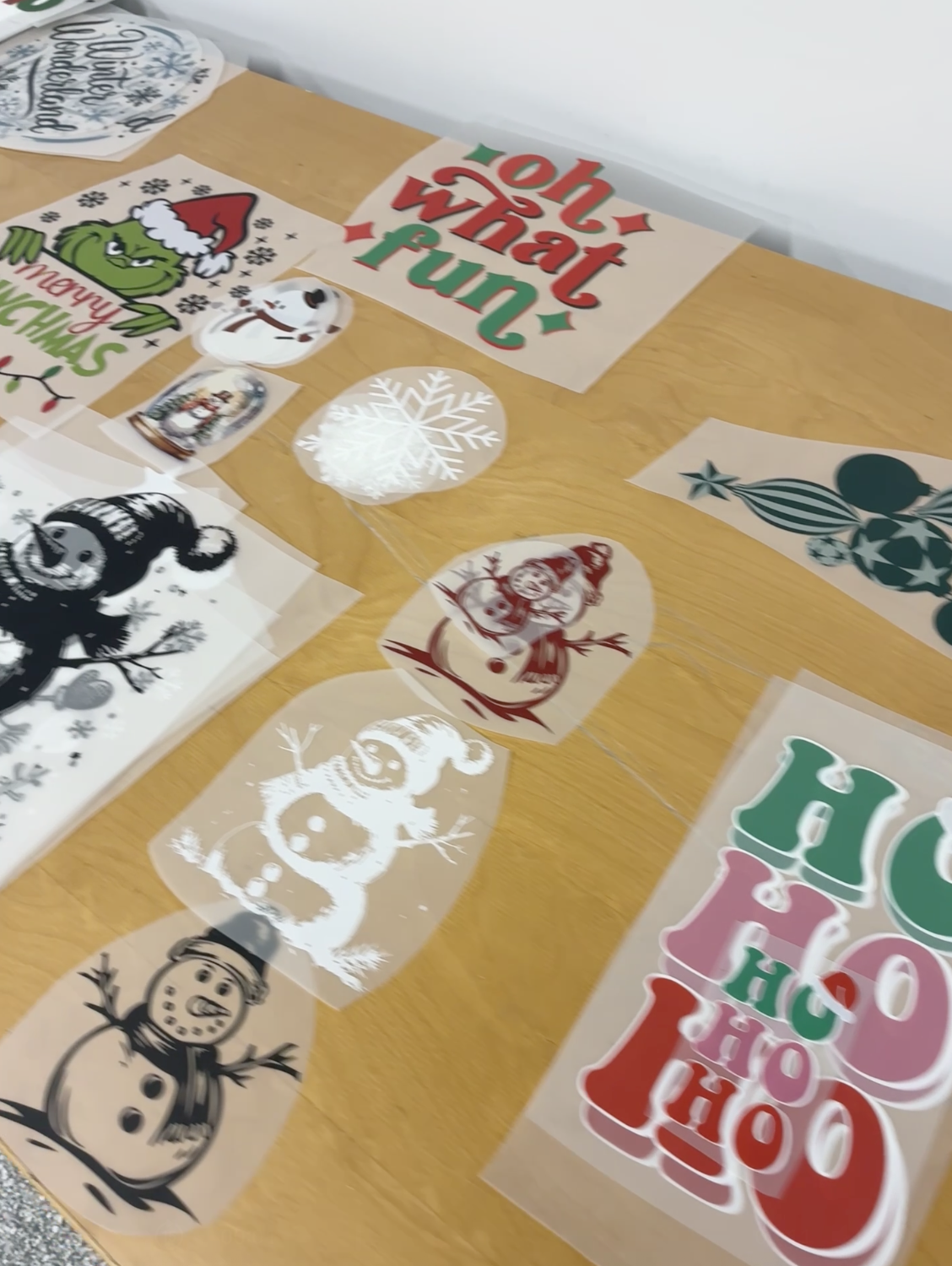 Premade designs displayed at a print party.