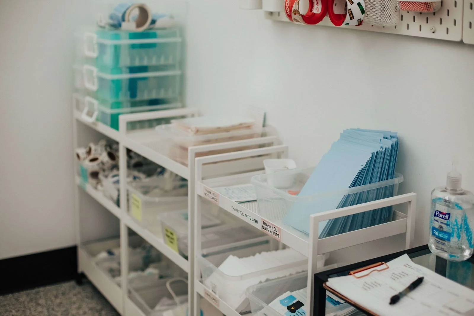Organized work stations at TAC with labeled bins, and visual guides.