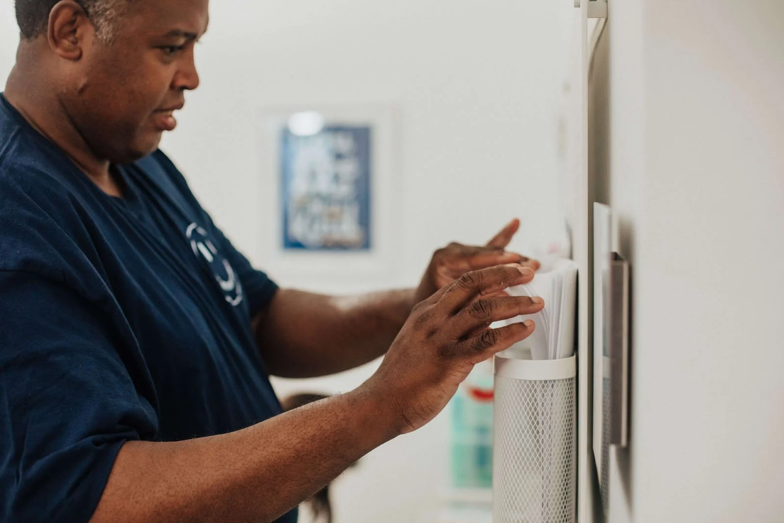 Organized print shop workstation with visual instructions, clear labels, and tools.