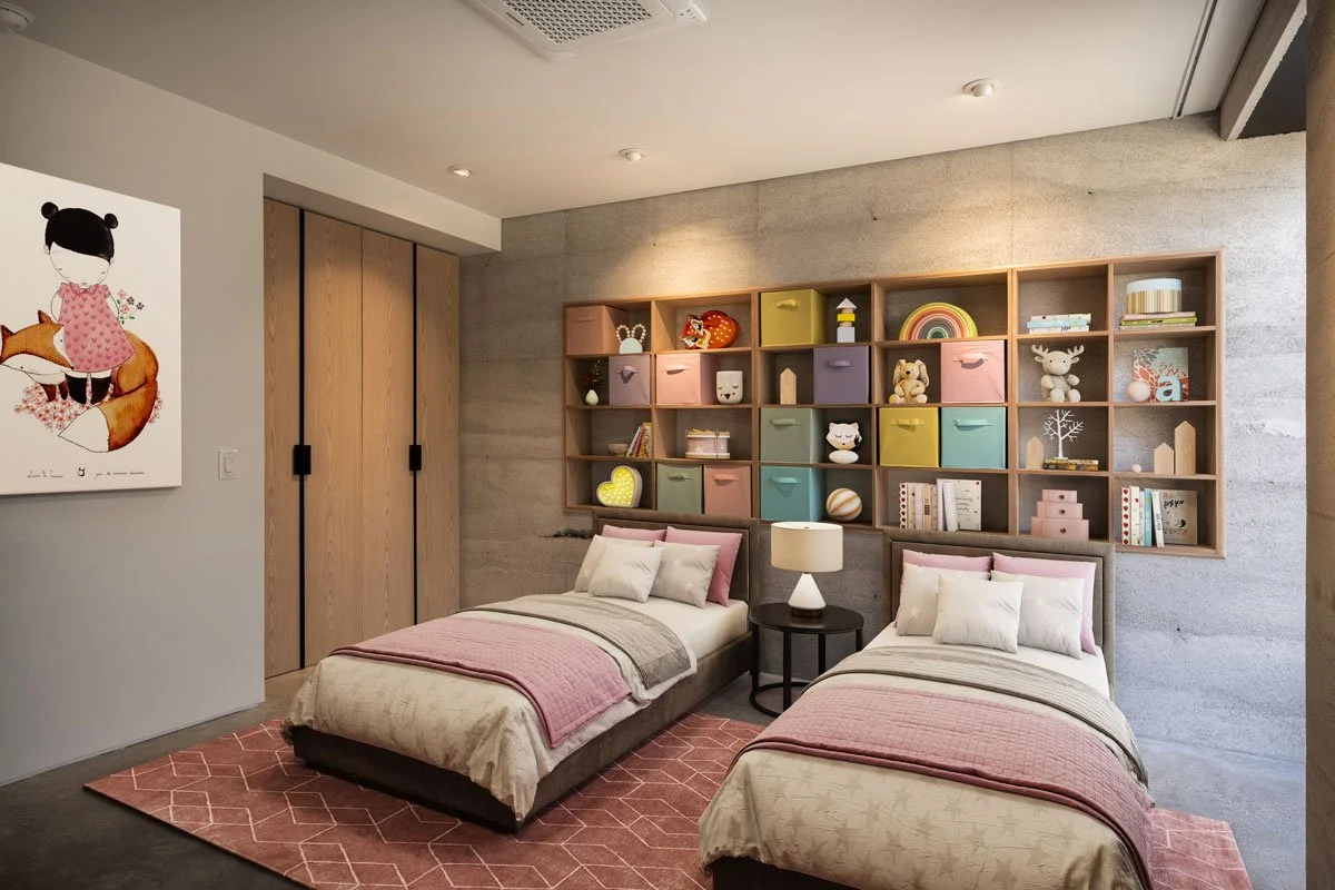 Kid’s bedroom with playful décor against solid Rammed Earth walls.