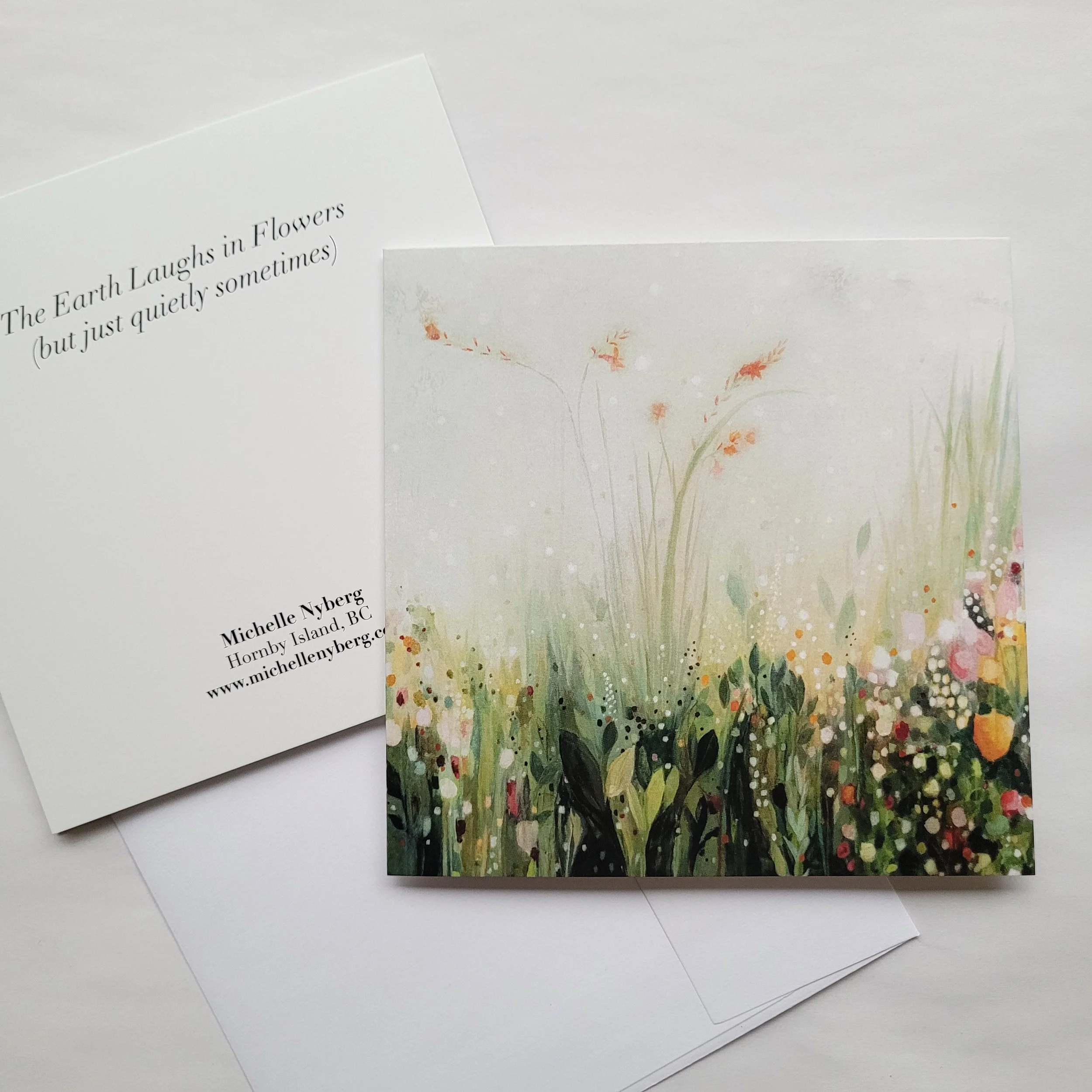 'The Earth Laughs in Flowers' greeting card