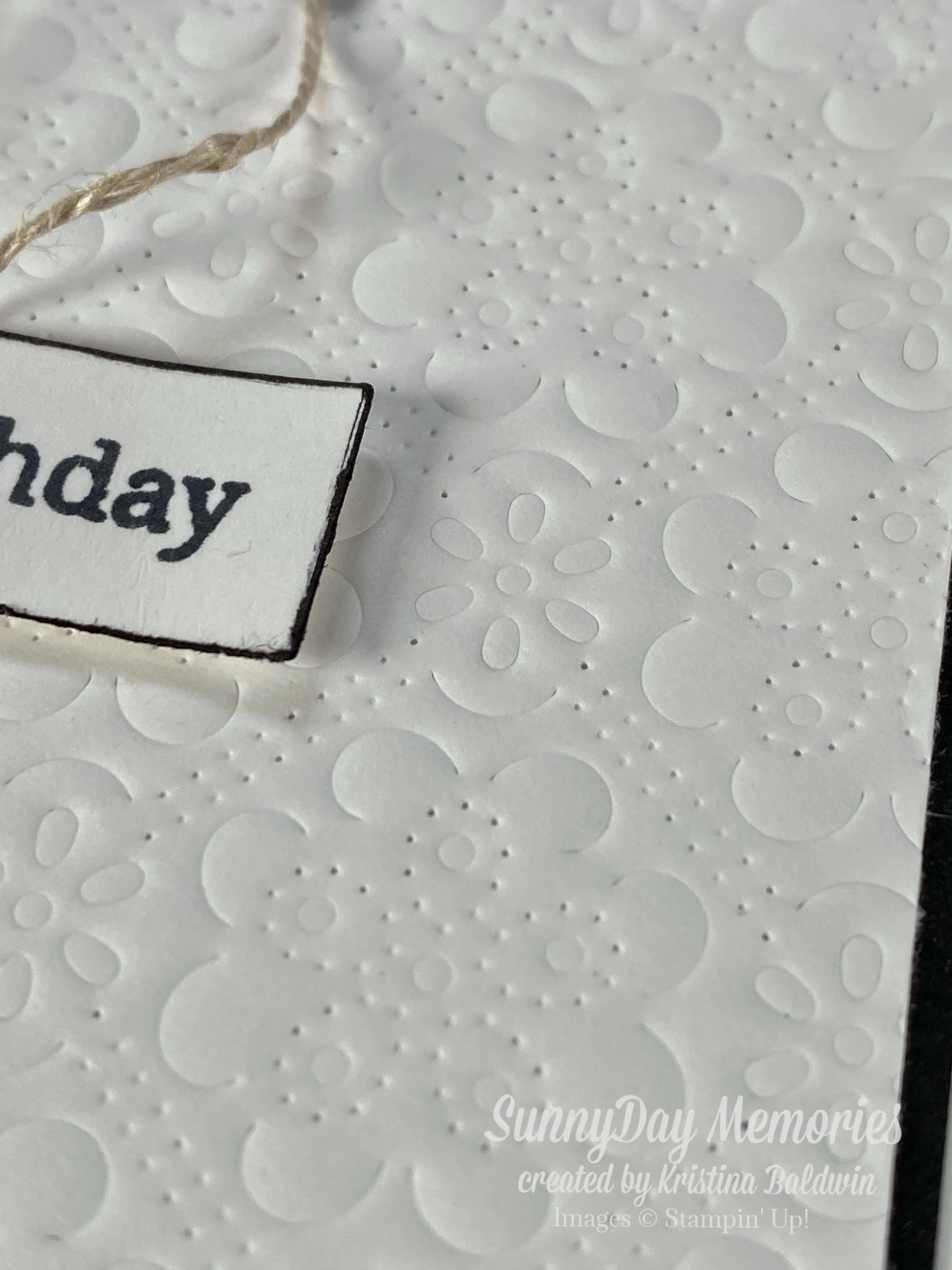 Closeup of Embossed Eyelet Blooms Birthday Card