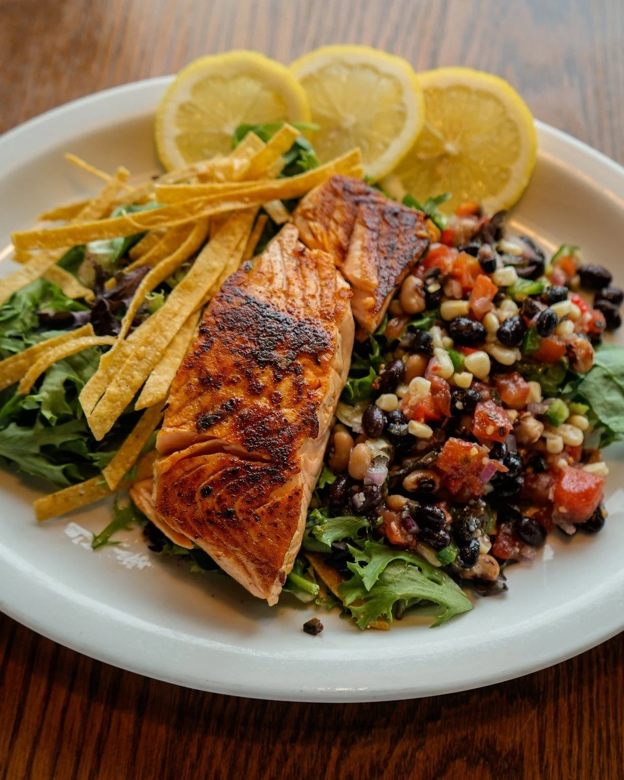 Fresh, flavorful, and 15% OFF all March 🤩🐟🥗

Grilled salmon served over fresh greens with a vibrant bean &amp; corn salad, crispy tortilla strips, and a squeeze of lemon &mdash; the perfect light but satisfying meal.

Stop by Sub Station Mexican G