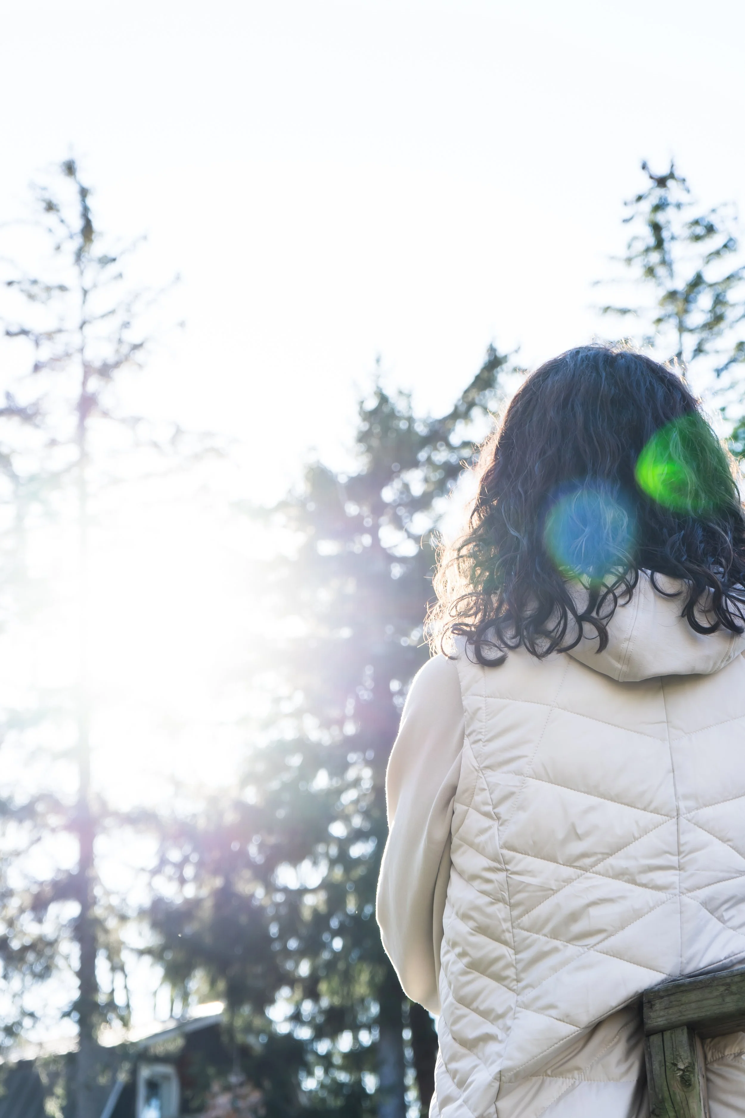 Lisa Koole looking toward warm sunshine outdoors