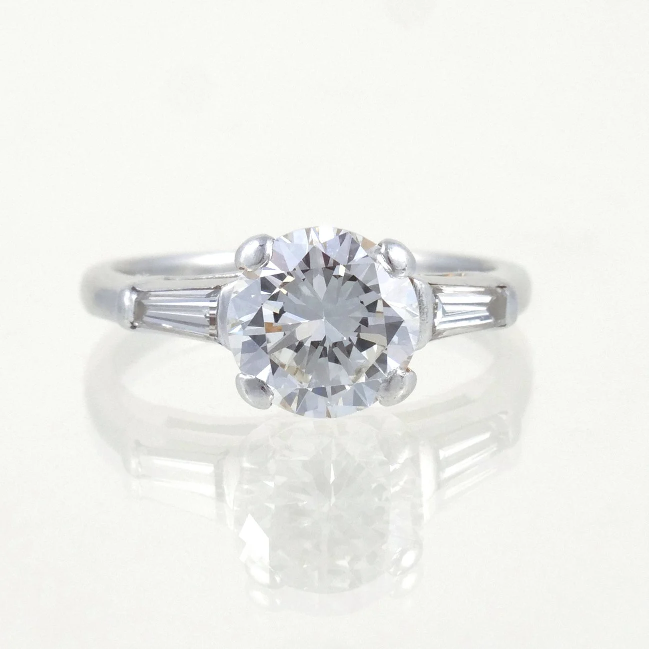 PLATINUM ROUND BRILLIANT DIAMOND RING 
Approx. 1.5 cts, VS2, G-H color 
$3,000-5,000