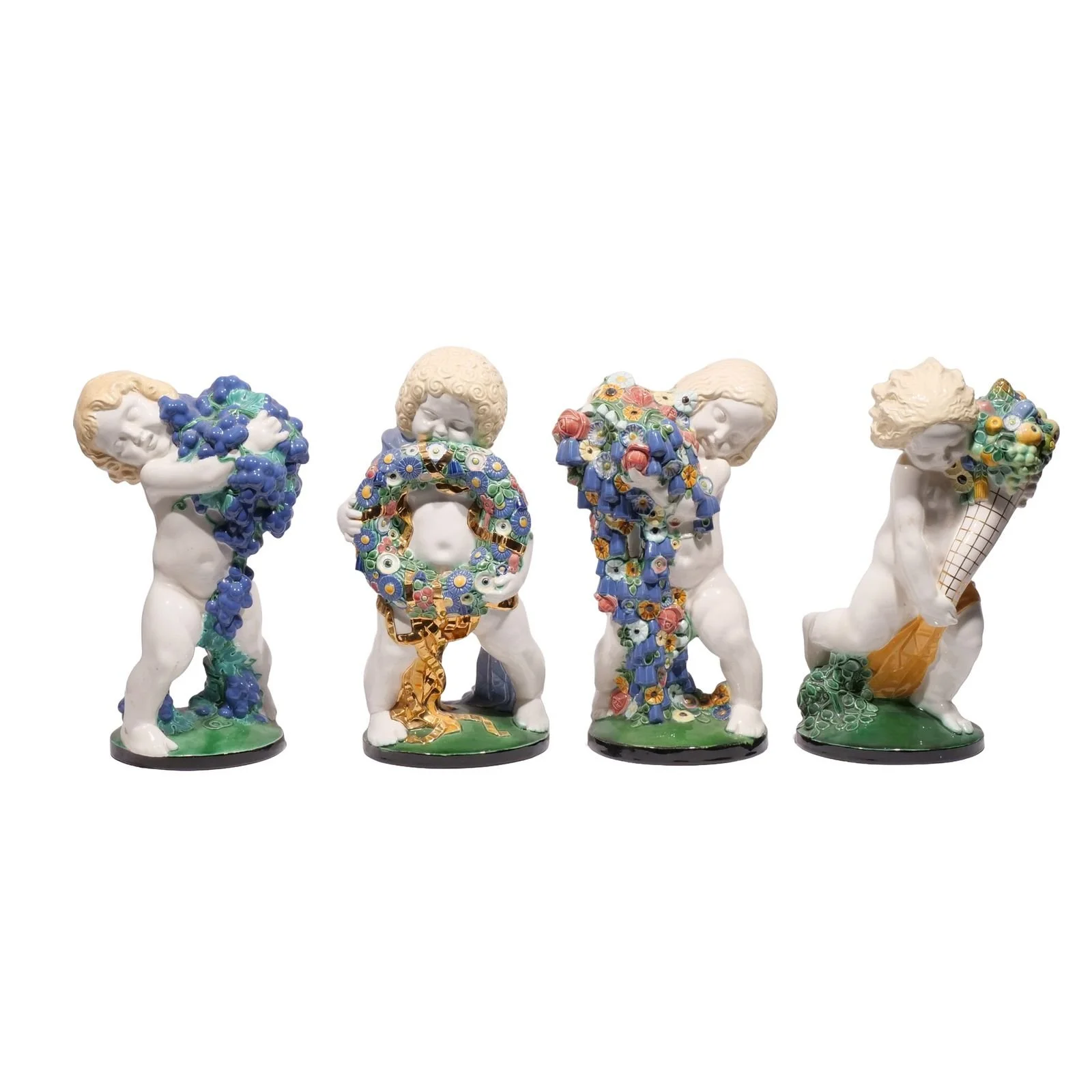 MICHAEL POWOLNY, "FOUR SEASONS" WIENER KERAMIK 
Vienna, Austria, early 20th century 
Porcelain, glazed 
h. 14-3/4 in. (ea. approx.) 
Sold in March 2024 
 Hammer: $29,000