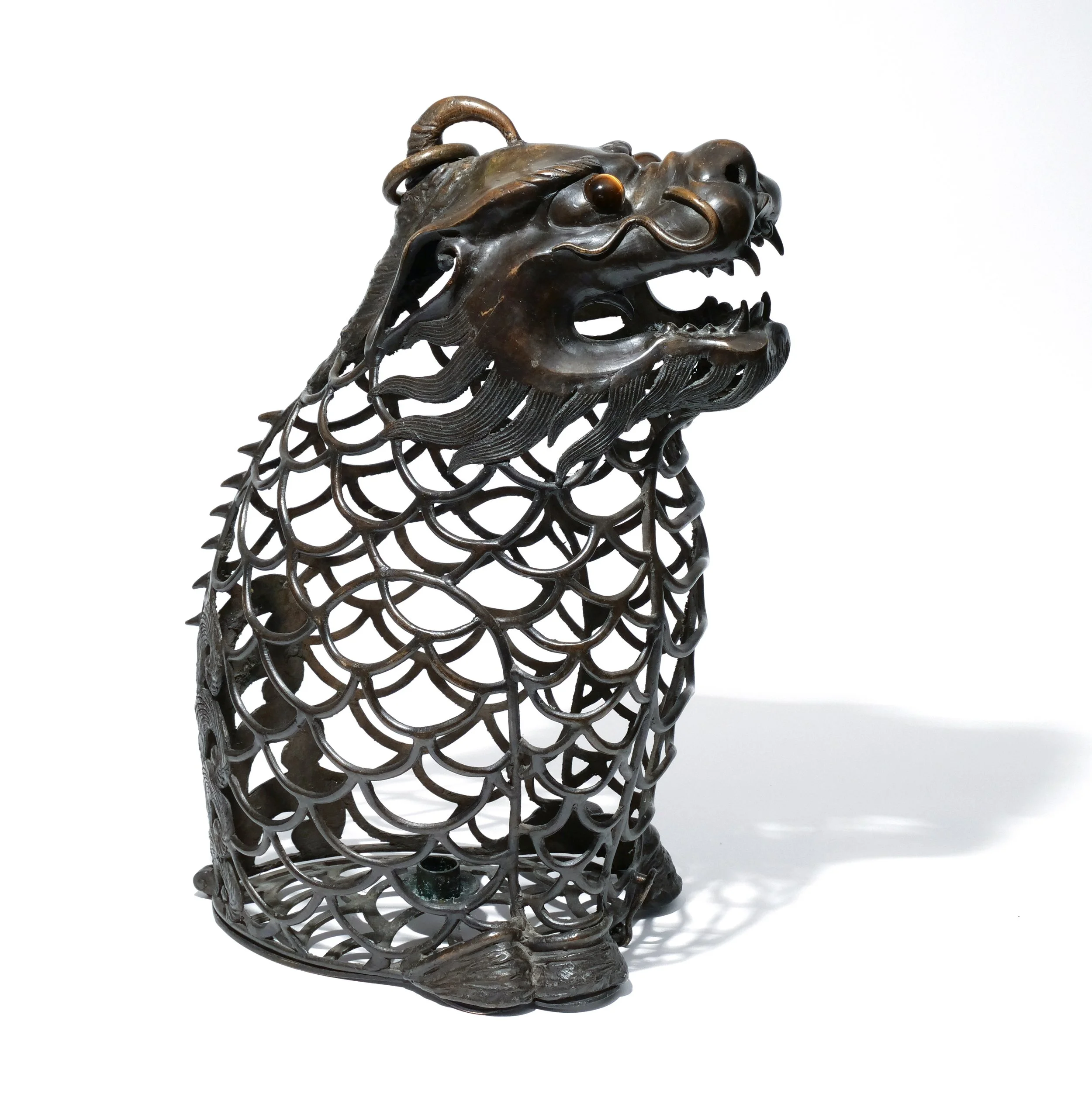 BRONZE RETICULATED KIRIN-FORM LANTERN 
Likely Japanese, 19th century or later 
$3,000-5,000