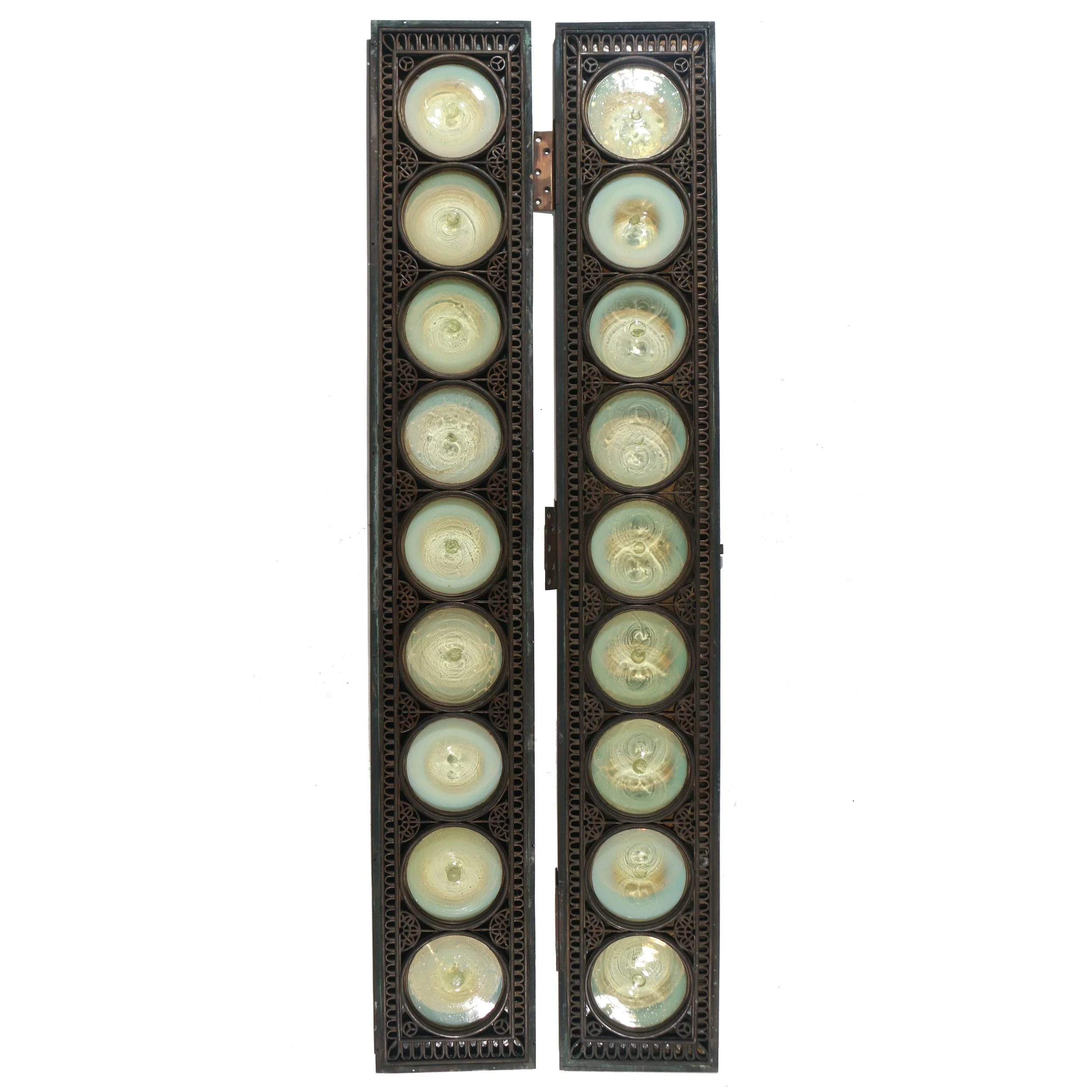 UNIQUE PAIR ARTS & CRAFTS LEADED GLASS WINDOWS 
both of long rectangular shape with nine glass roundels surrounded by geometric designs in lead piping with art glass panels(possibly Lalique) behind, one with hinges and a latch for use as a door, the