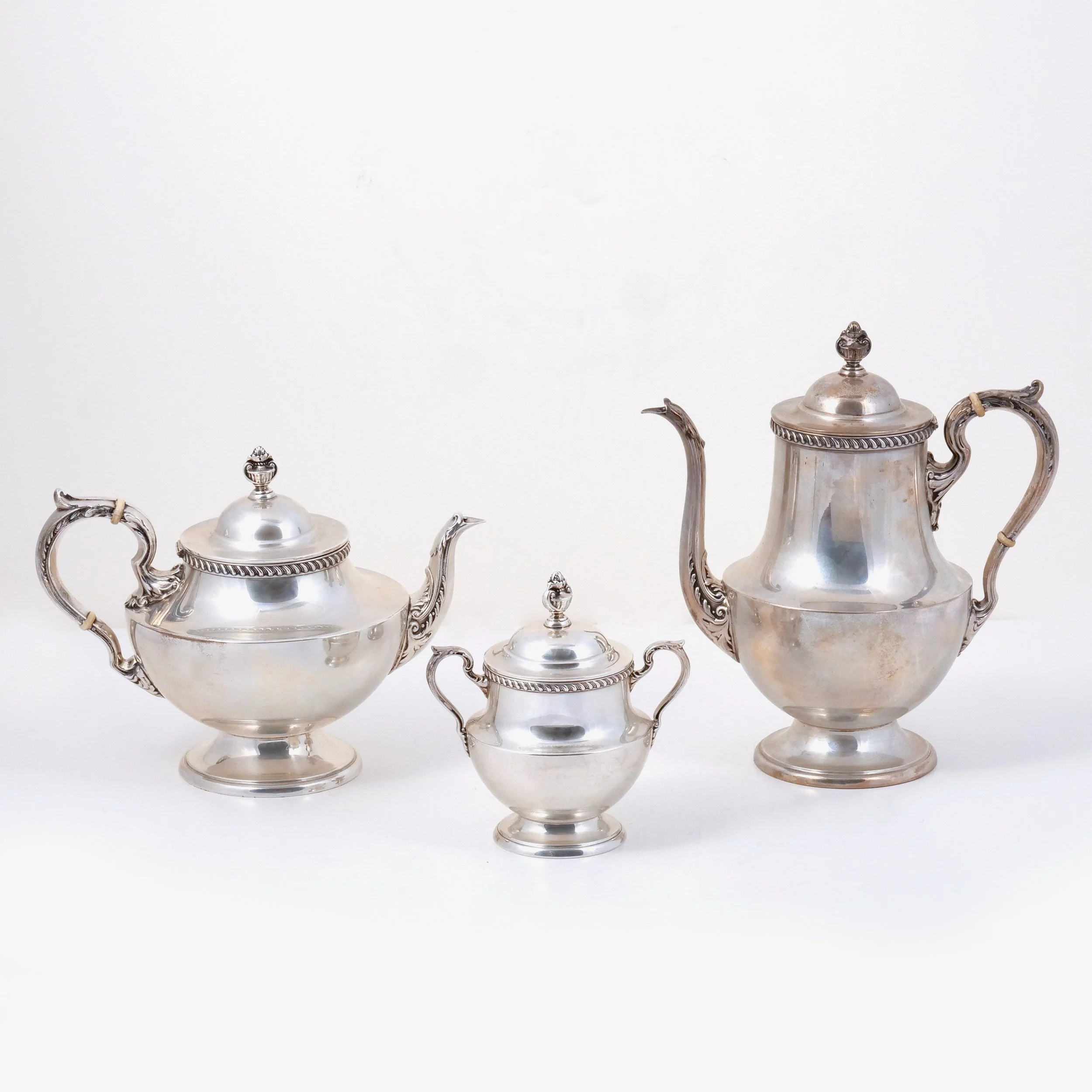 (3pc) POOLE STERLING SILVER TEA SET  
In the 'Georgian' pattern 
$3,000-5,000