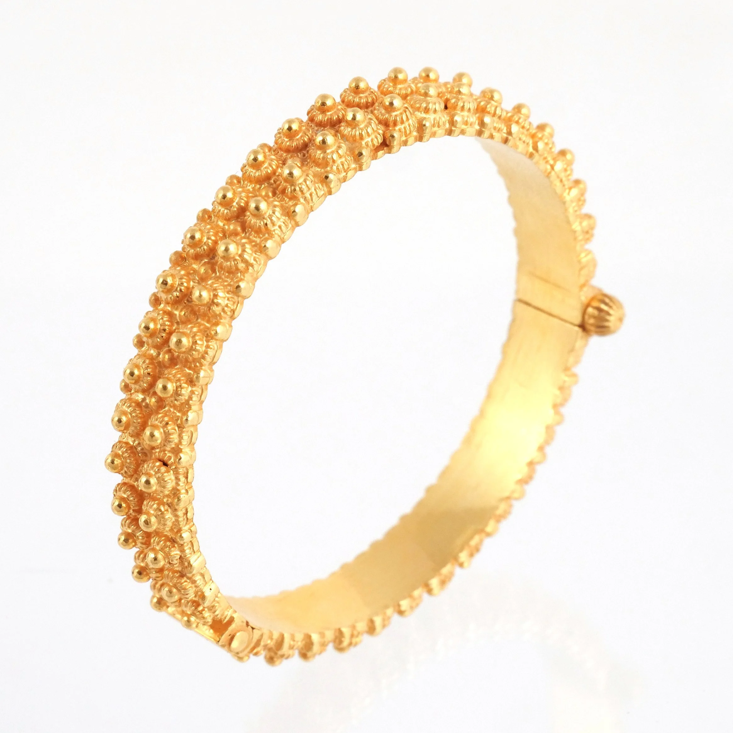 INDIAN 22K GOLD HARD BRACELET 
6-1/2 in. interior circumference, 64 grams 
$5,000-7,000