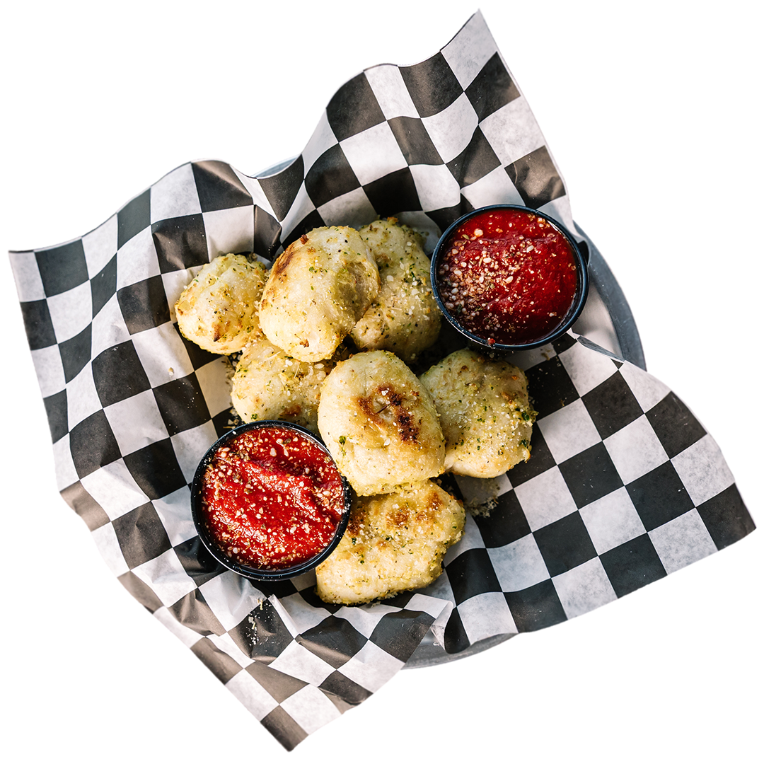 GARLIC KNOTS: Expertly woven with garlic confit and fresh parsley