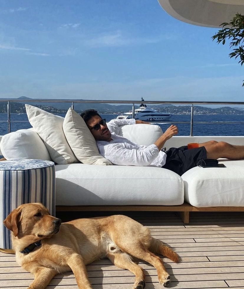 Man and Dog Resting on Patio.jpg