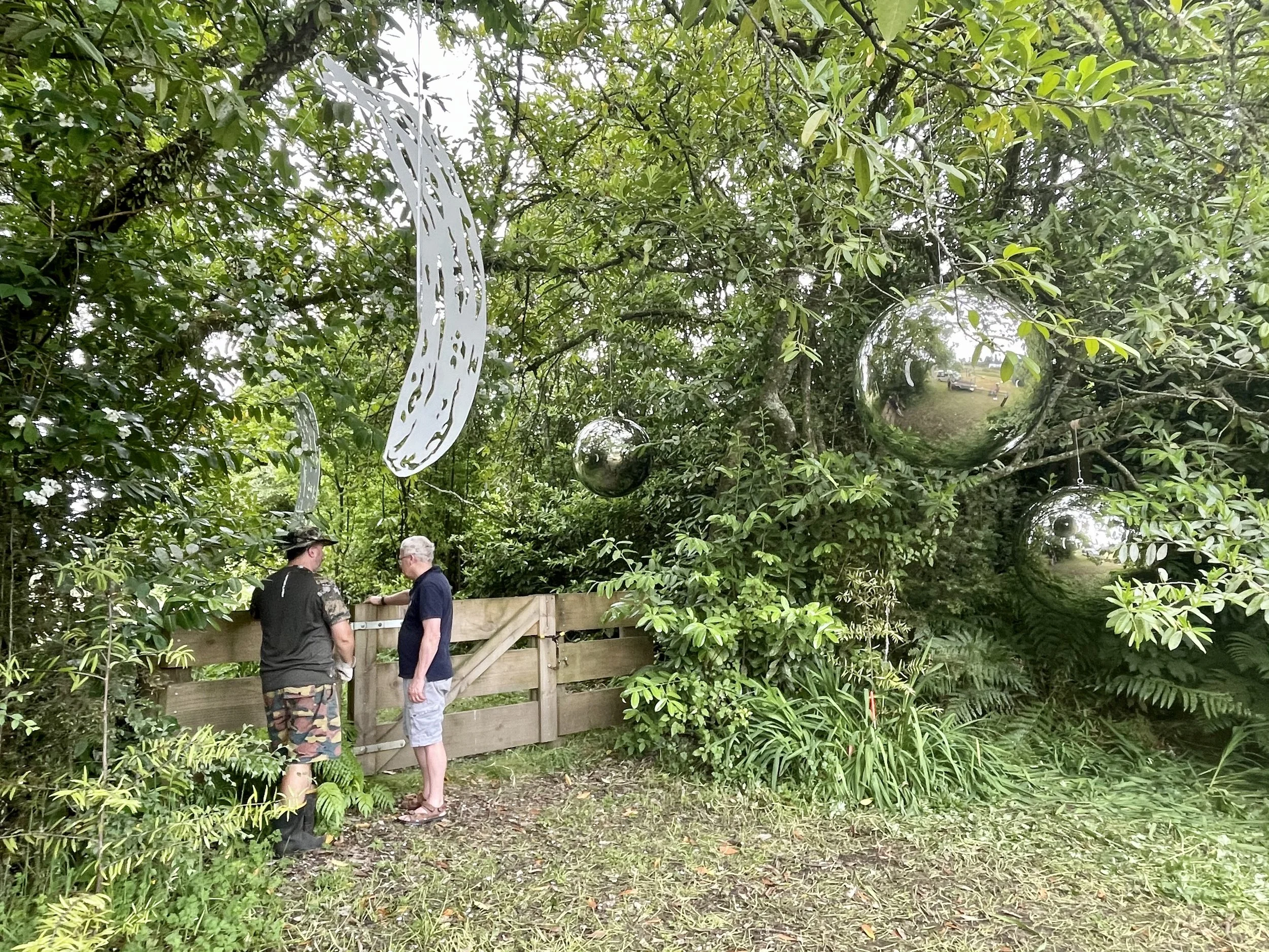 Lumina
Mirror-polished steel spheres suspended in a living tree reflect light, air, and sky — a quiet meditation on presence and transformation.
