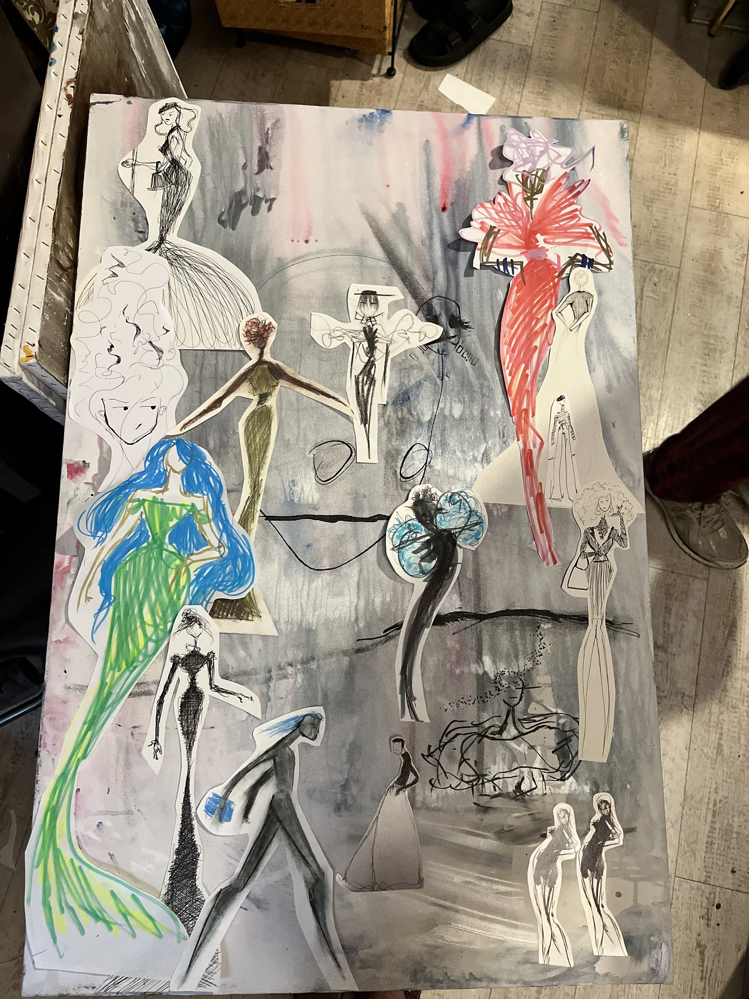 Sketches and drawings of fashion models and dresses on a gray and pink painted background, with some colored and some in black and white, arranged in an artistic collage.