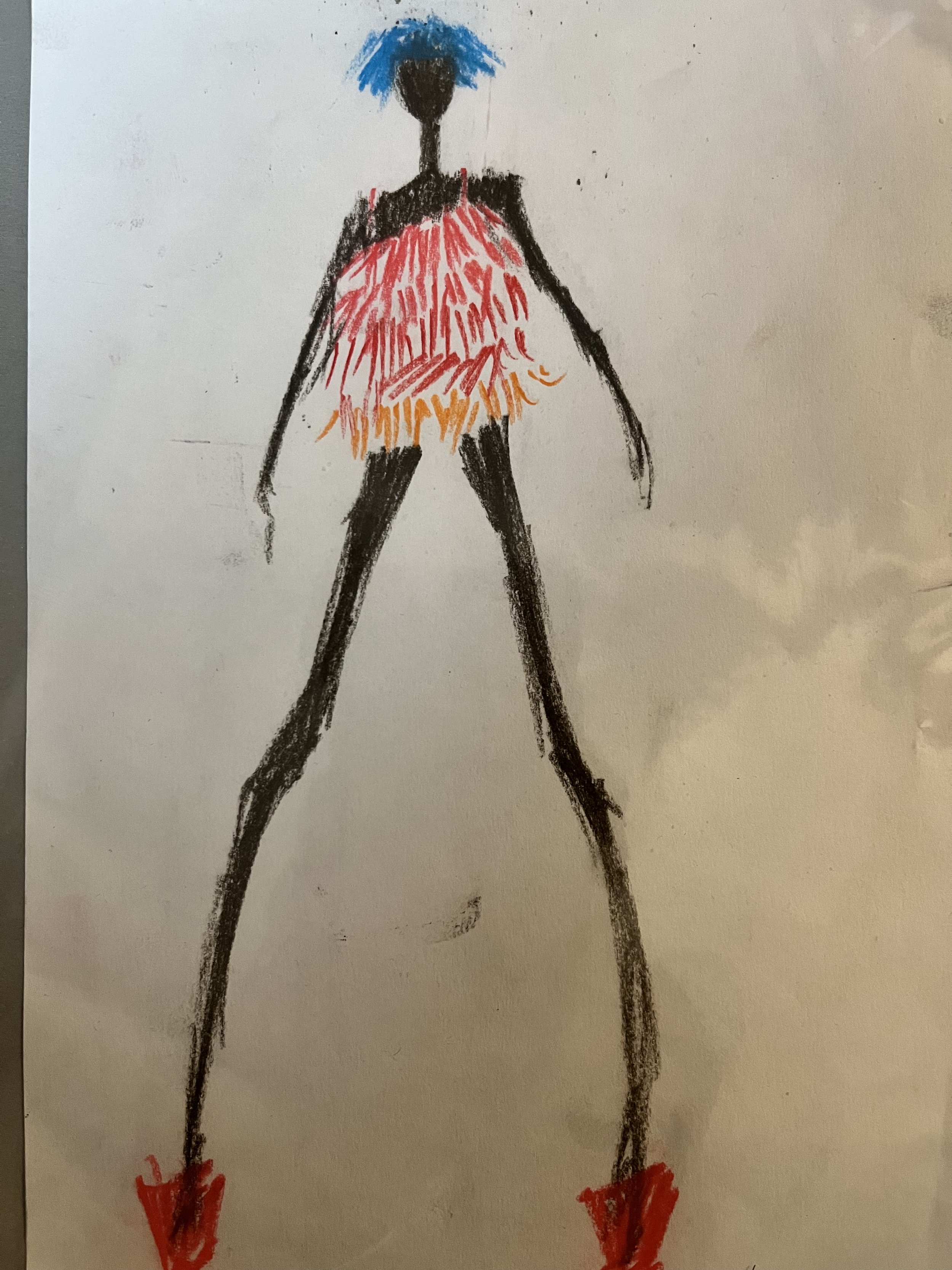Child's drawing of a tall woman with blue hair, wearing a pink and orange dress, red shoes, and long black legs.
